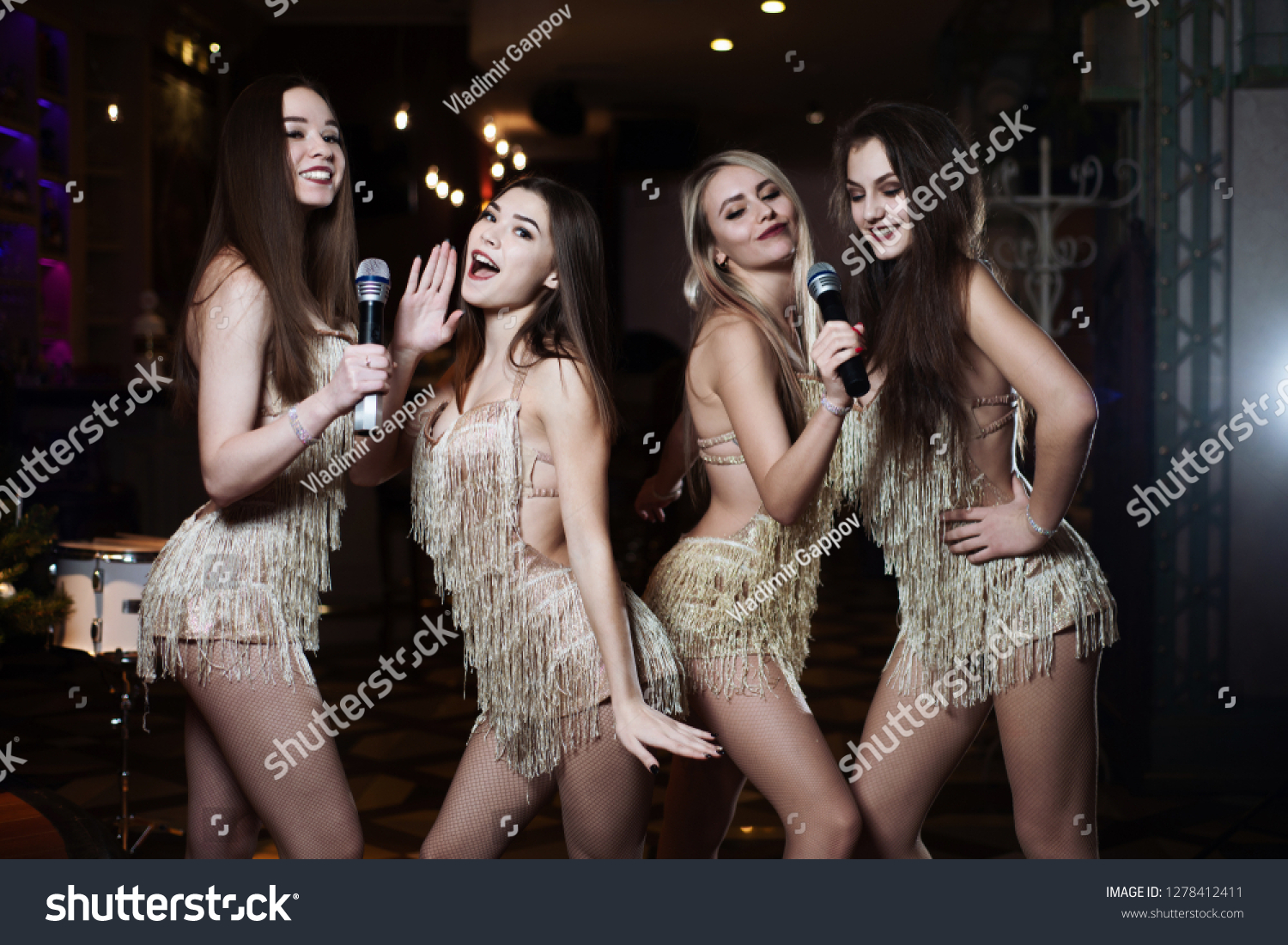 Beautiful Women Singing Karaoke Songs Microphones Stock Photo