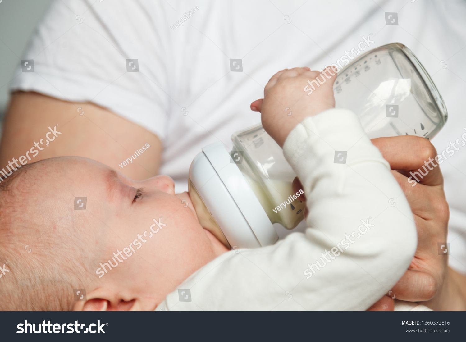 Baby Drinking Milk Bottle Holding By Stock Photo 1360372616 Shutterstock