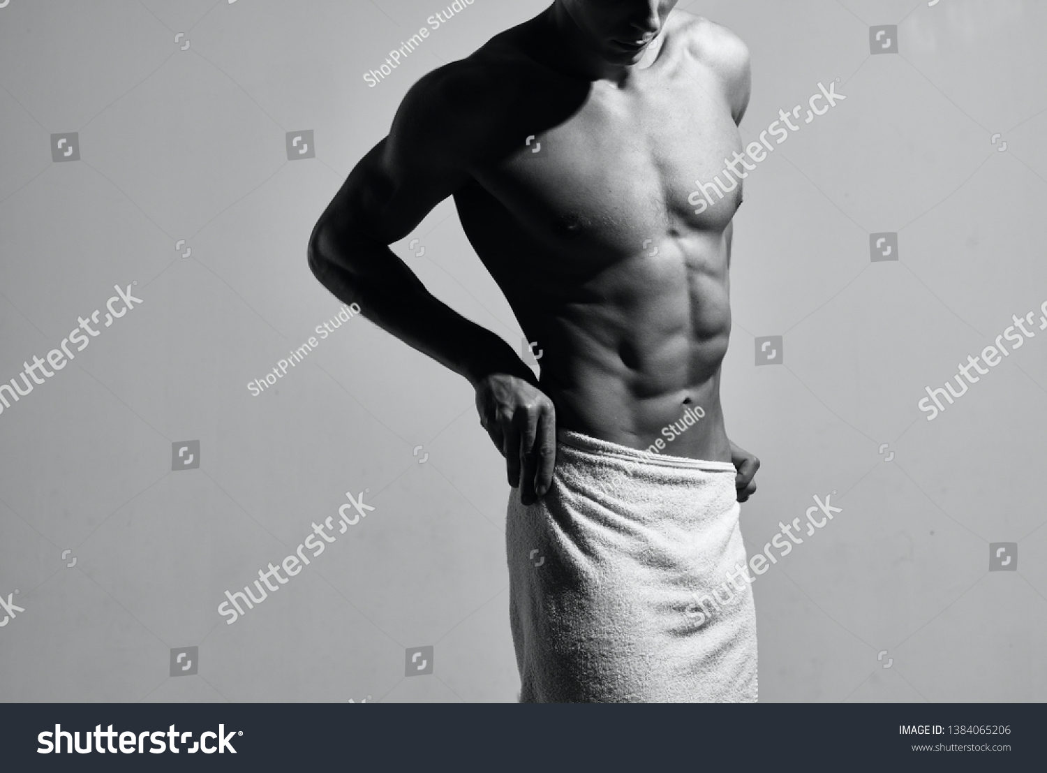 Male Bodybuilder Muscular Naked Torso Covered Stock Photo