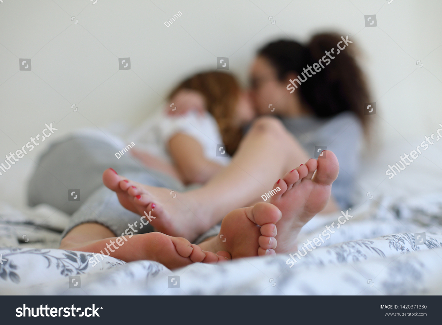 Brunette teen lesbians loving foot