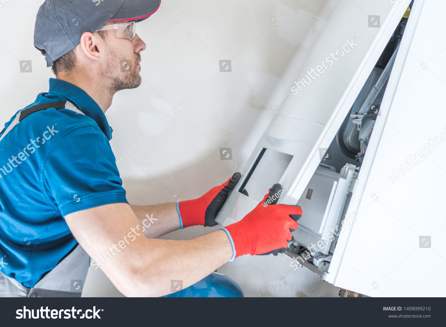 4 573 Man Repairing Boiler Stock Photos Images Photography