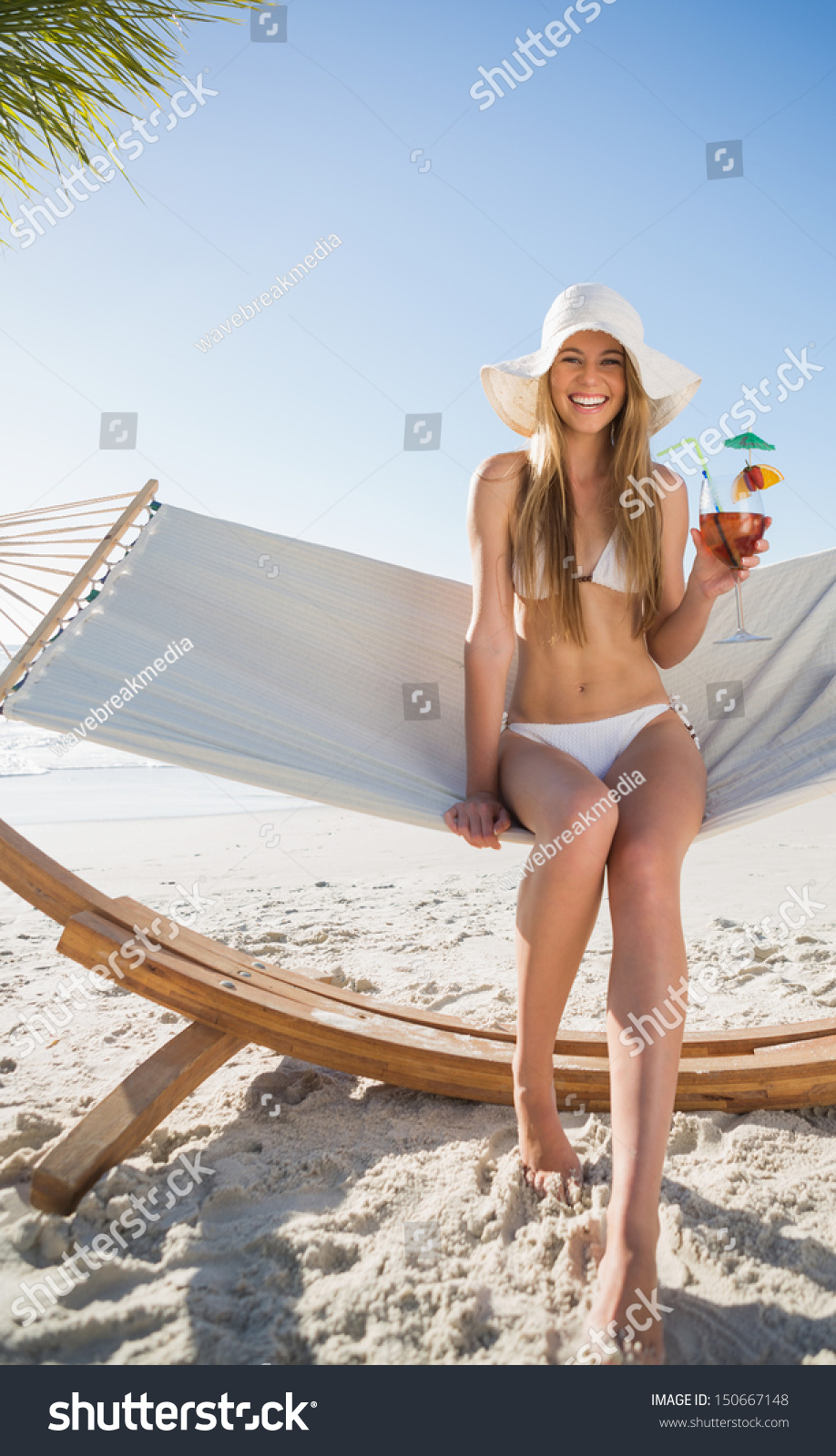 Cheerful Blonde Wearing Bikini Sunhat Sitting Stock Photo 150667148