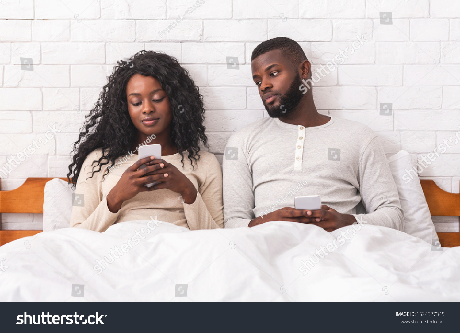 Jealous African Man Peeking Into Wifes Stock Photo 1524527345