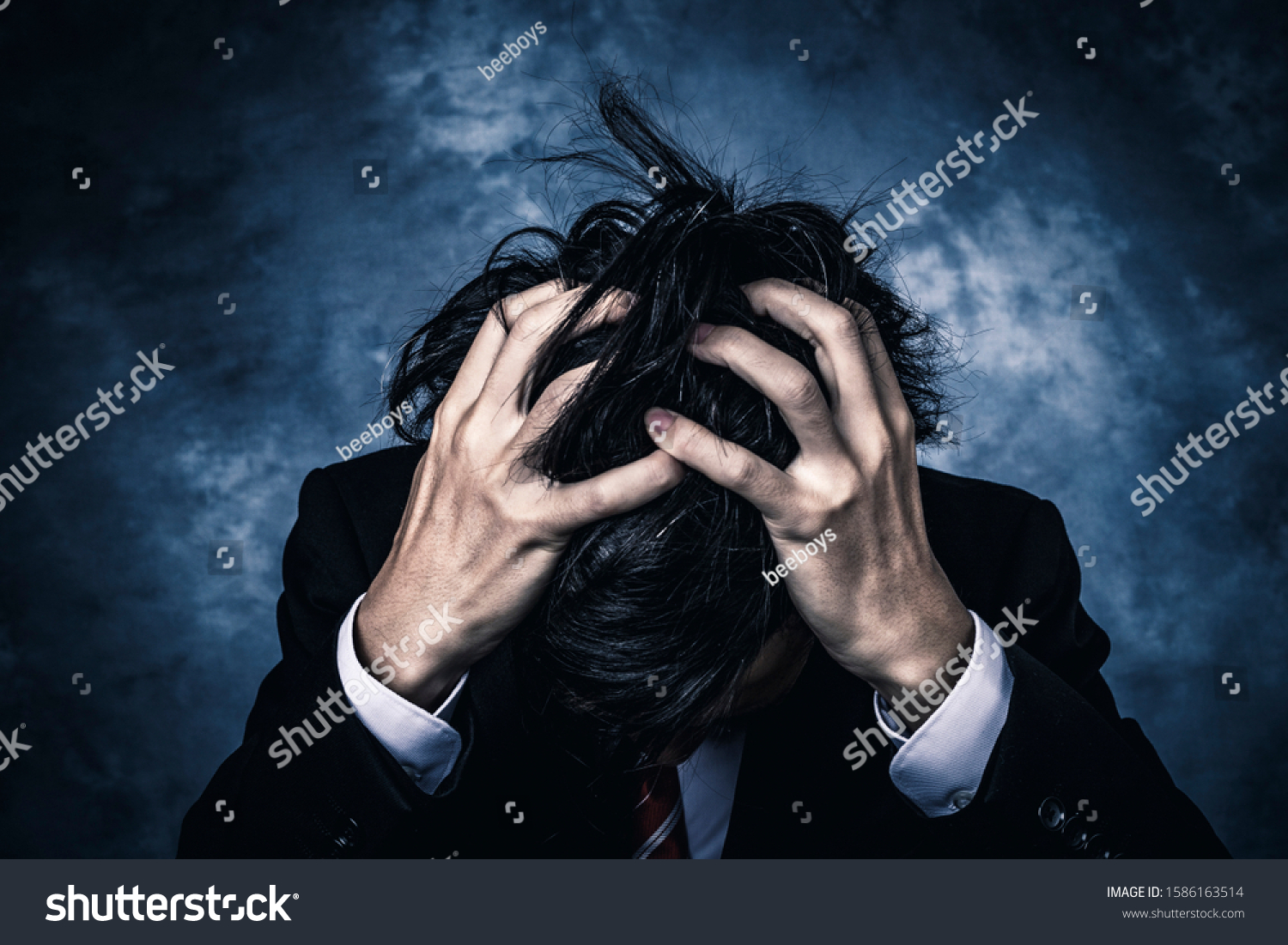 Businessman Holding His Head Despair Stock Photo 1586163514 Shutterstock