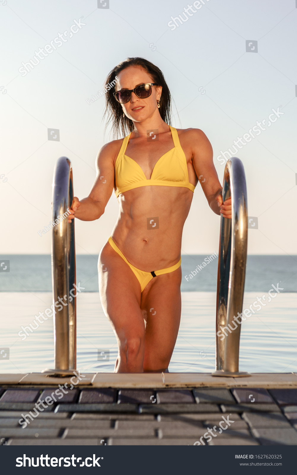 Brunette Woman Fitness Model Yellow Bikini Stock Photo