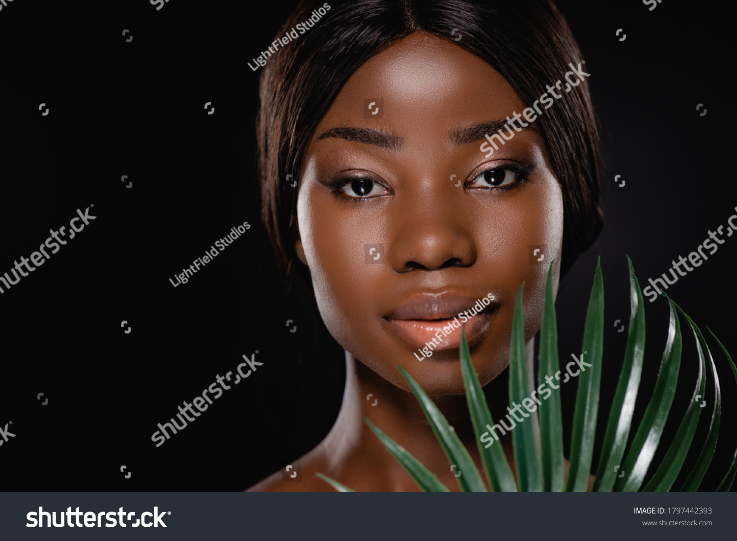 African American Naked Woman Green Palm Stock Photo