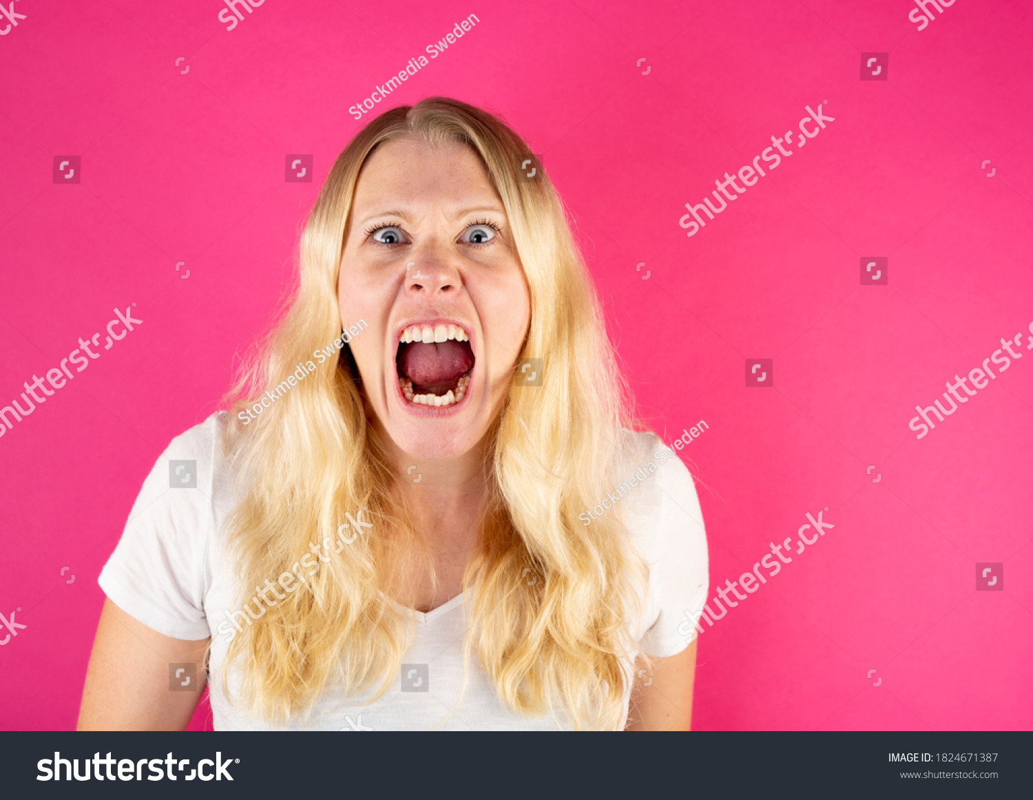 Screaming Angry Blonde Woman Looking Into Stock Photo 1824671387