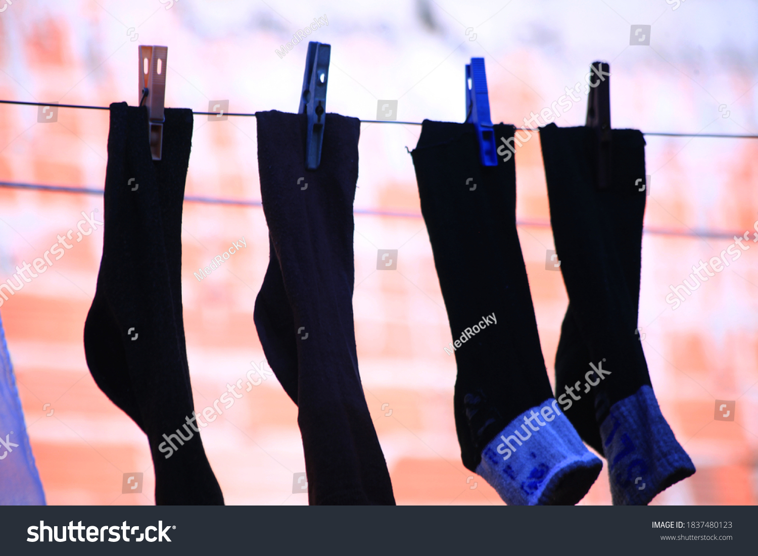 Black Socks Hanging Brick Wall Background Stock Photo Shutterstock