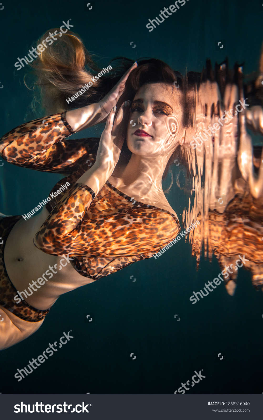 Sexy Girl Leopard Lingerie Swims Underwater Stock Photo