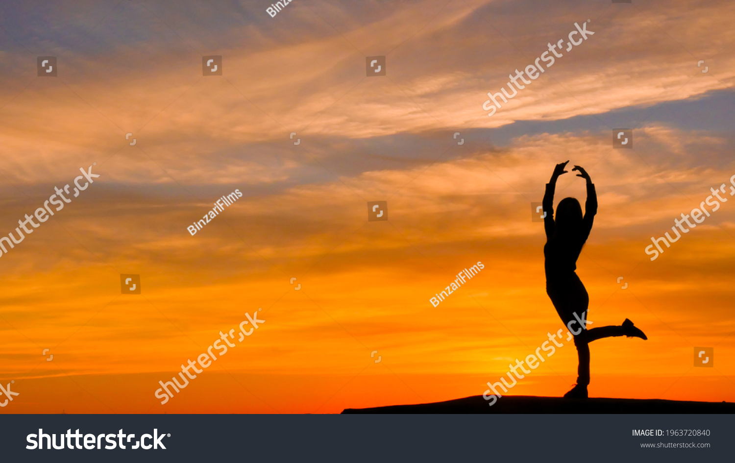 Silhouette Woman Arms Raised Ballerina Position Stock Photo