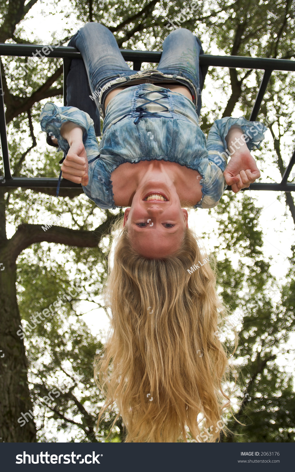 Blond Girl Hanging Upside Down Outdoor Foto Stok Shutterstock