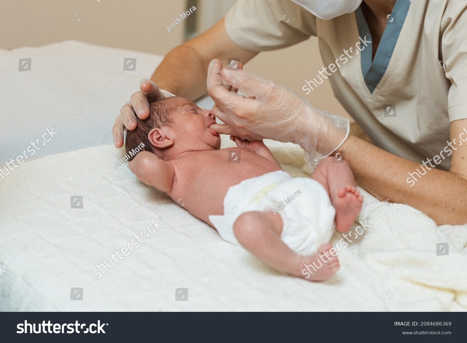 Professional Physiotherapist Performing Suction Assessment Newborn