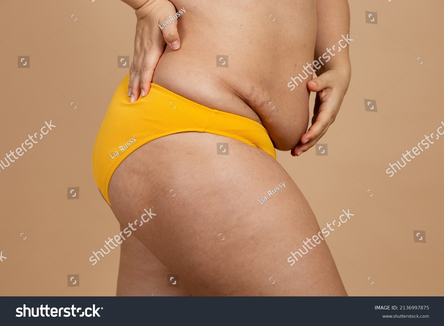 Cropped Image Overweight Woman Tucking Hiding Stock Photo