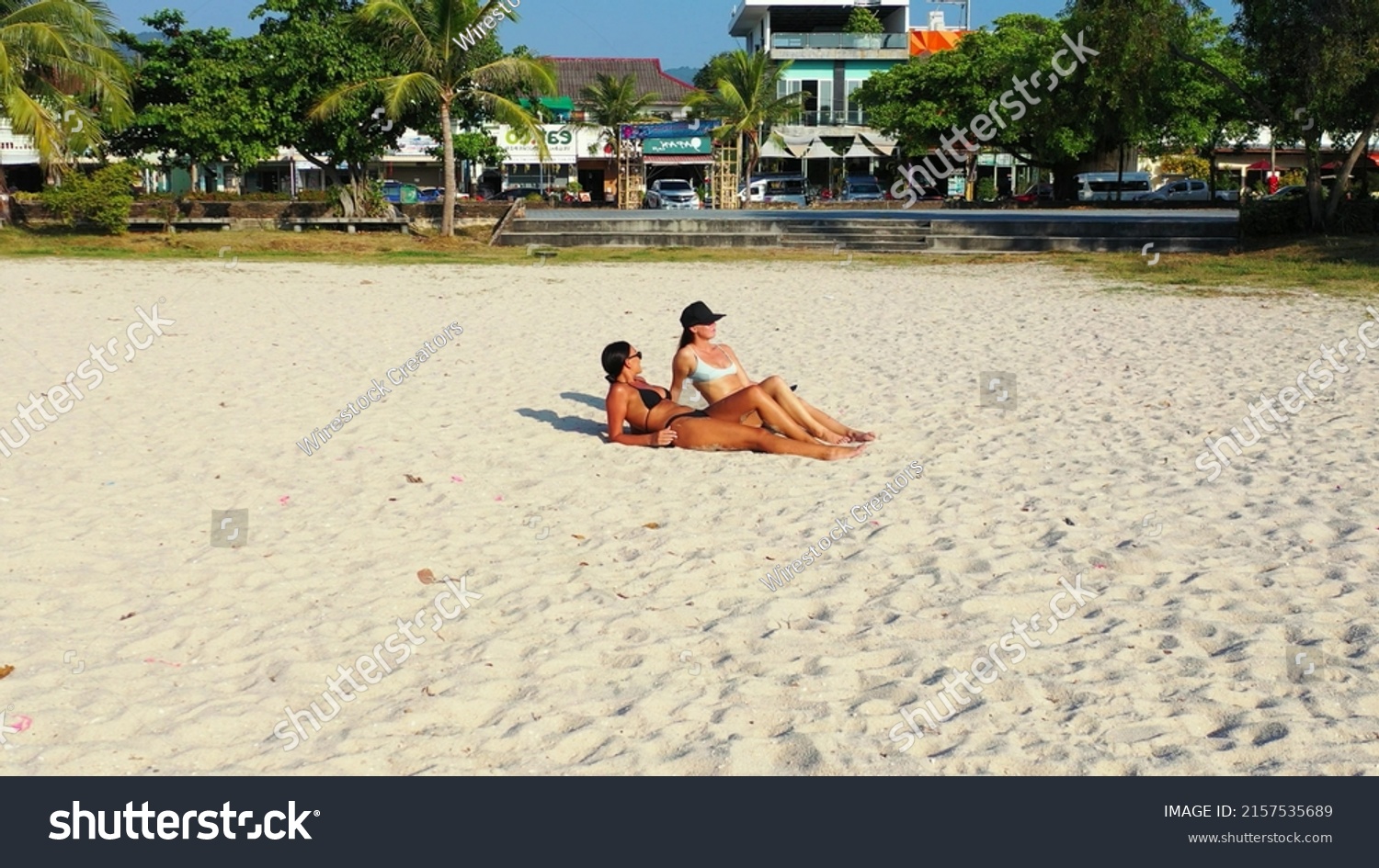 Two Caucasian Pretty Females Bikini Laying Stock Photo