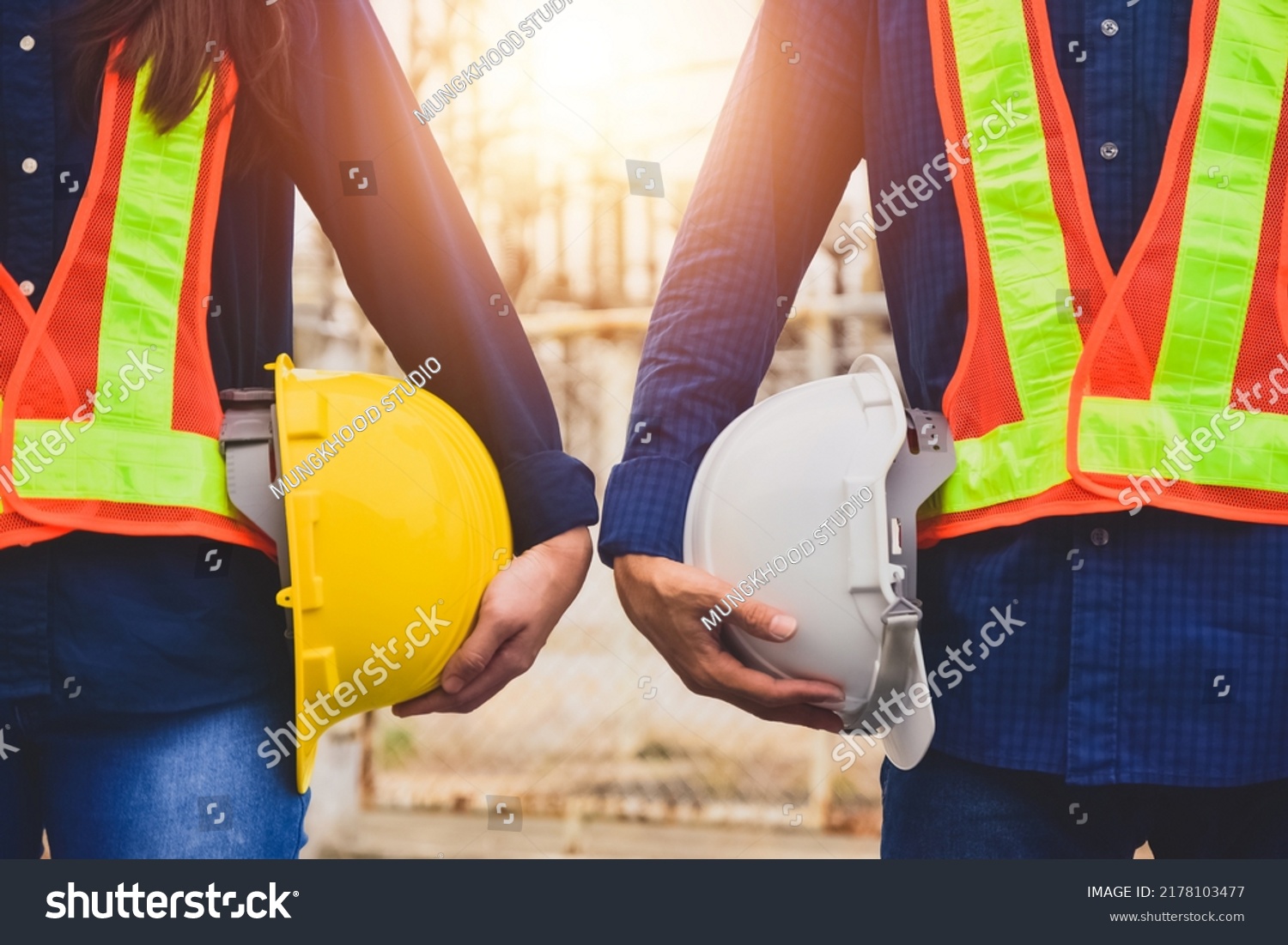 Team Engineer Holding Safety Helmet On Stock Photo 2178103477