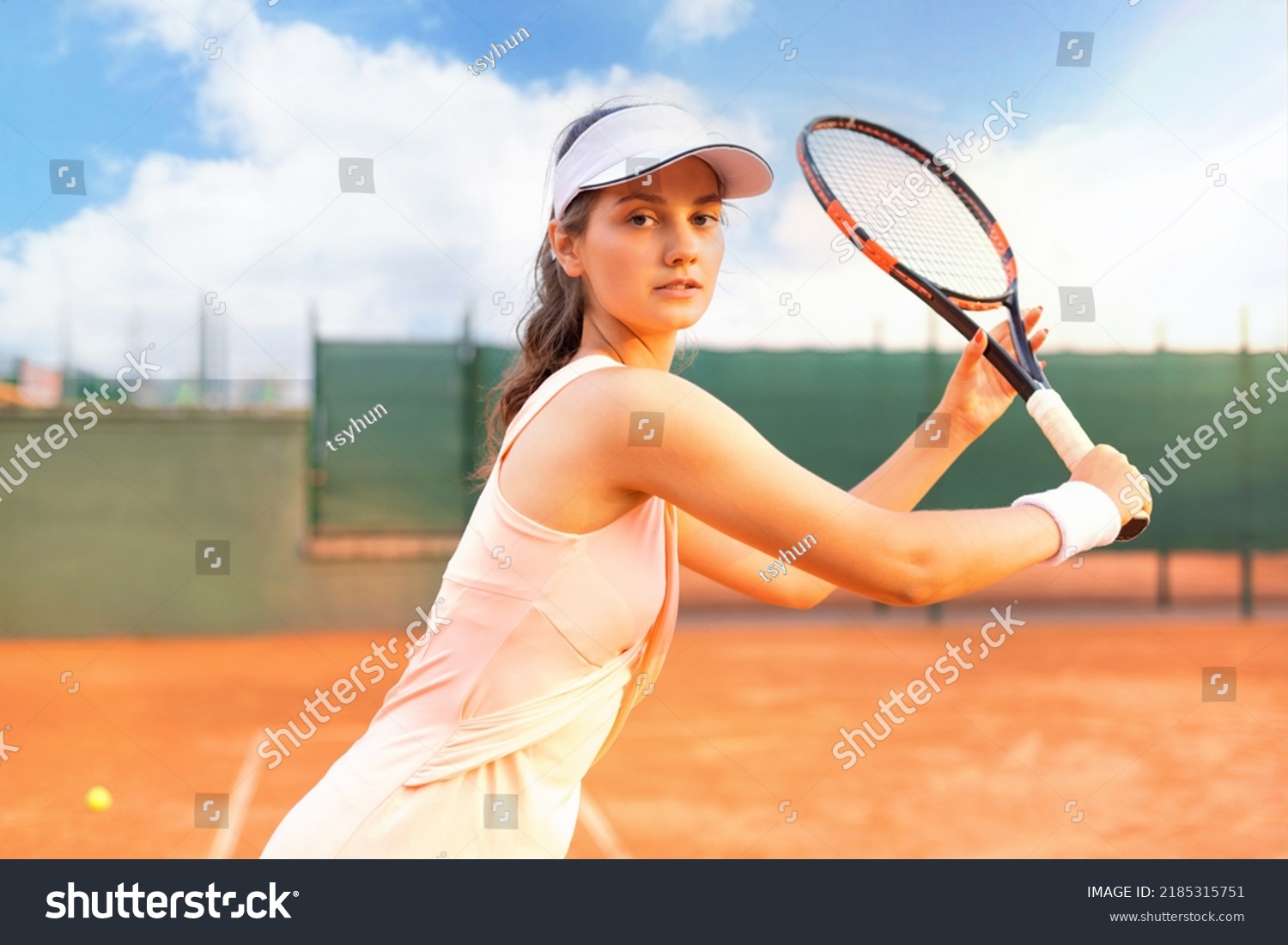 Professional Equipped Female Tennis Player Beating Stock Photo