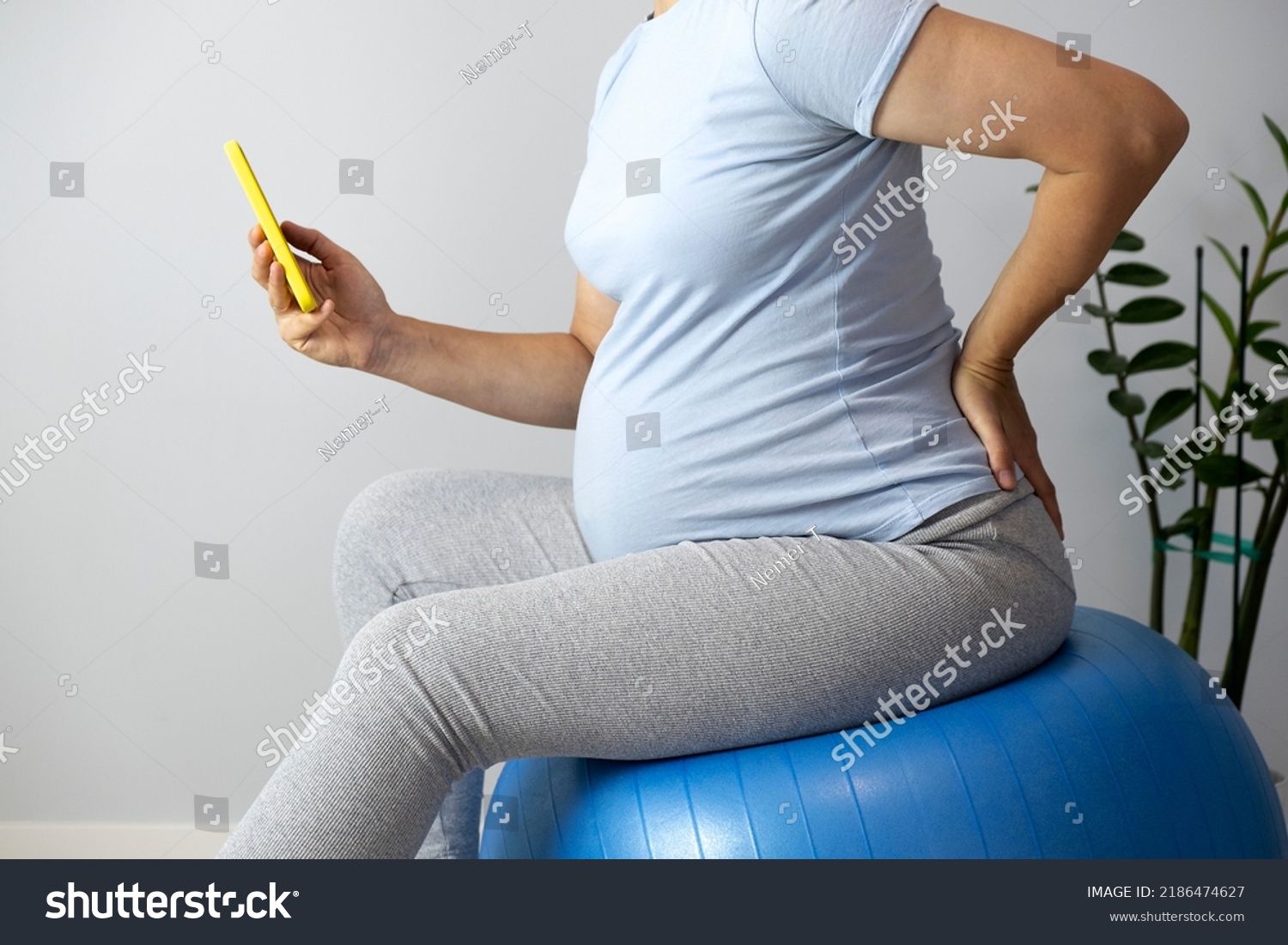 Pregnant Woman Feel Contractions Sitting On Stock Photo