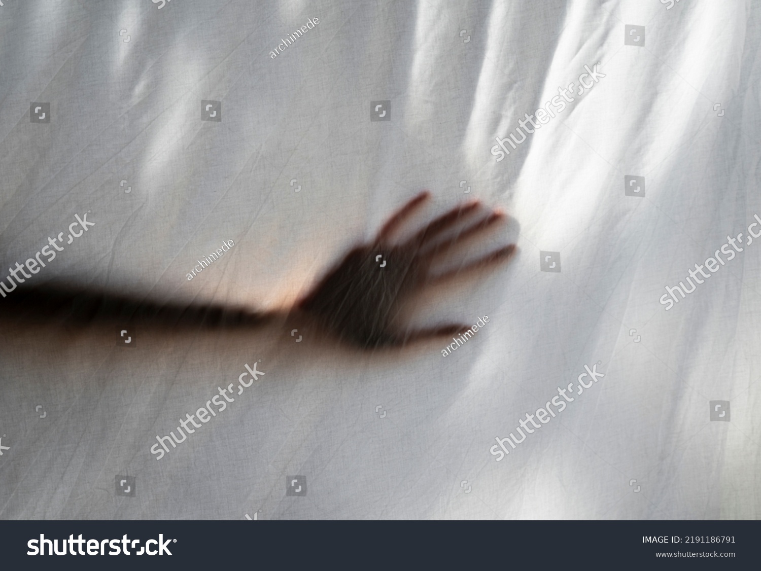 Hand Shade Behind White Sheet Anonymous Stock Photo 2191186791