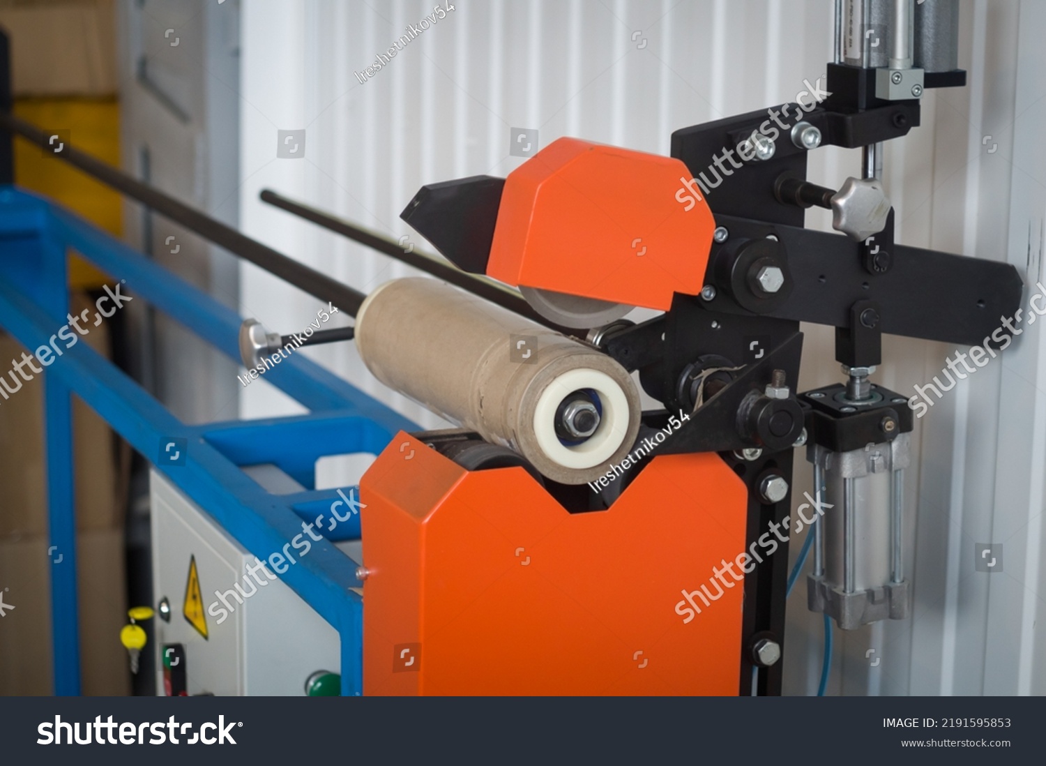 Modern Machine Cutting Cardboard Cores Special Stock Photo