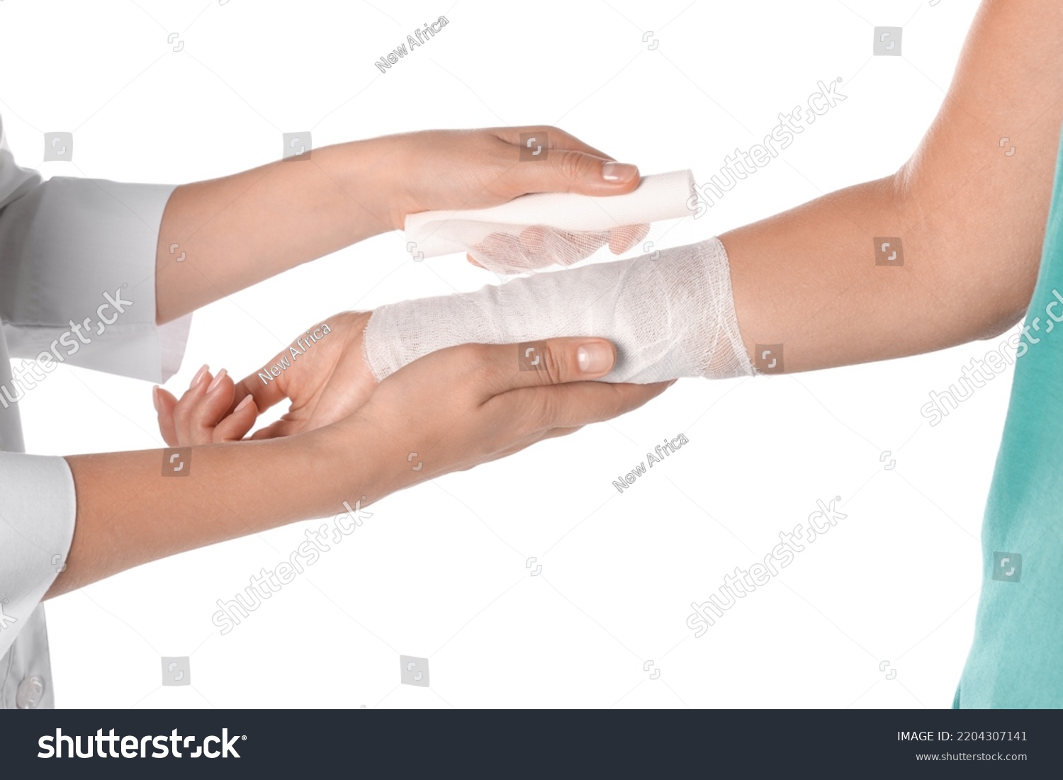 Doctor Applying Bandage Onto Patients Arm Stock Photo 2204307141