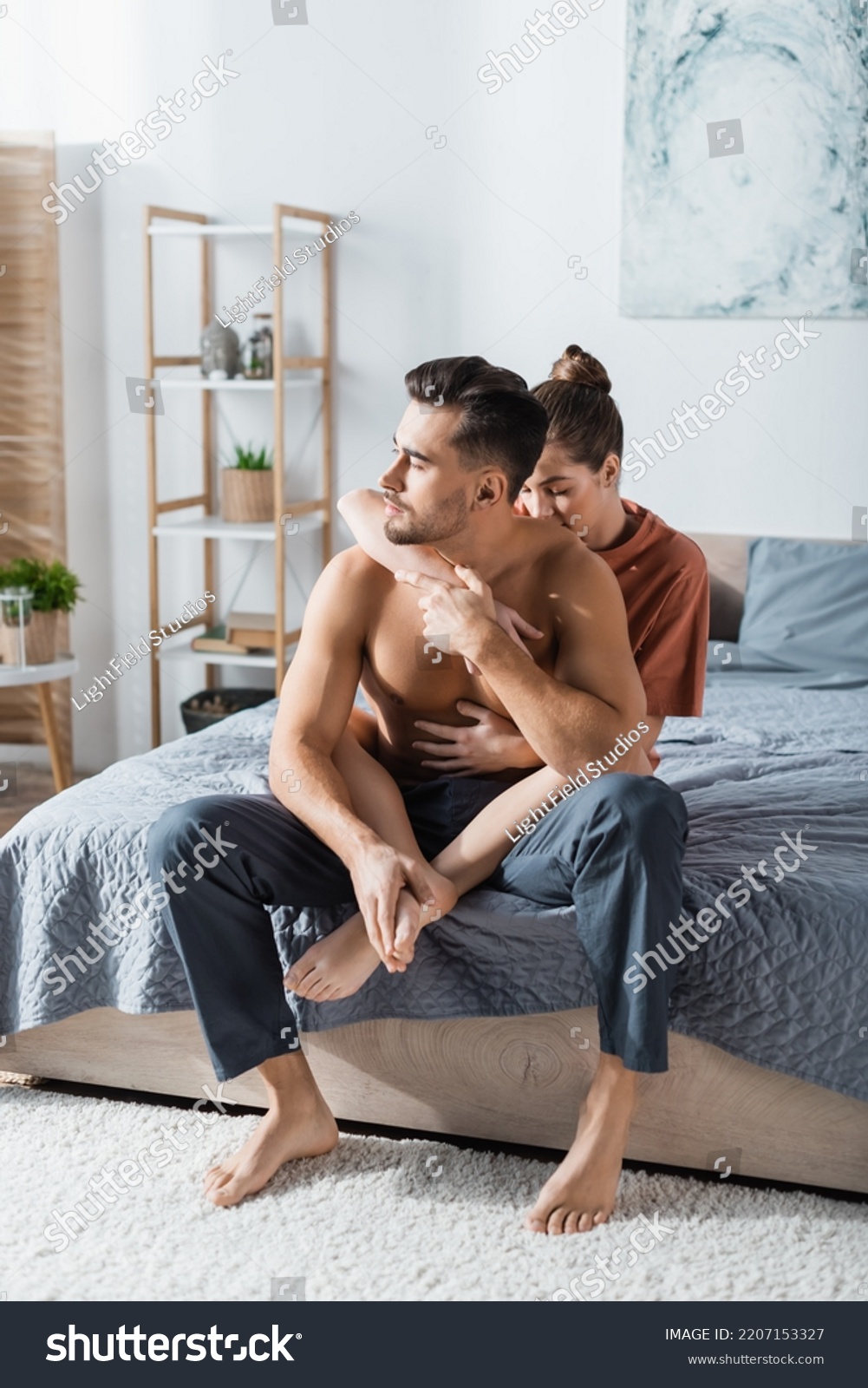 Seductive Woman Hugging Shirtless Man Pajama Stock Photo 2207153327