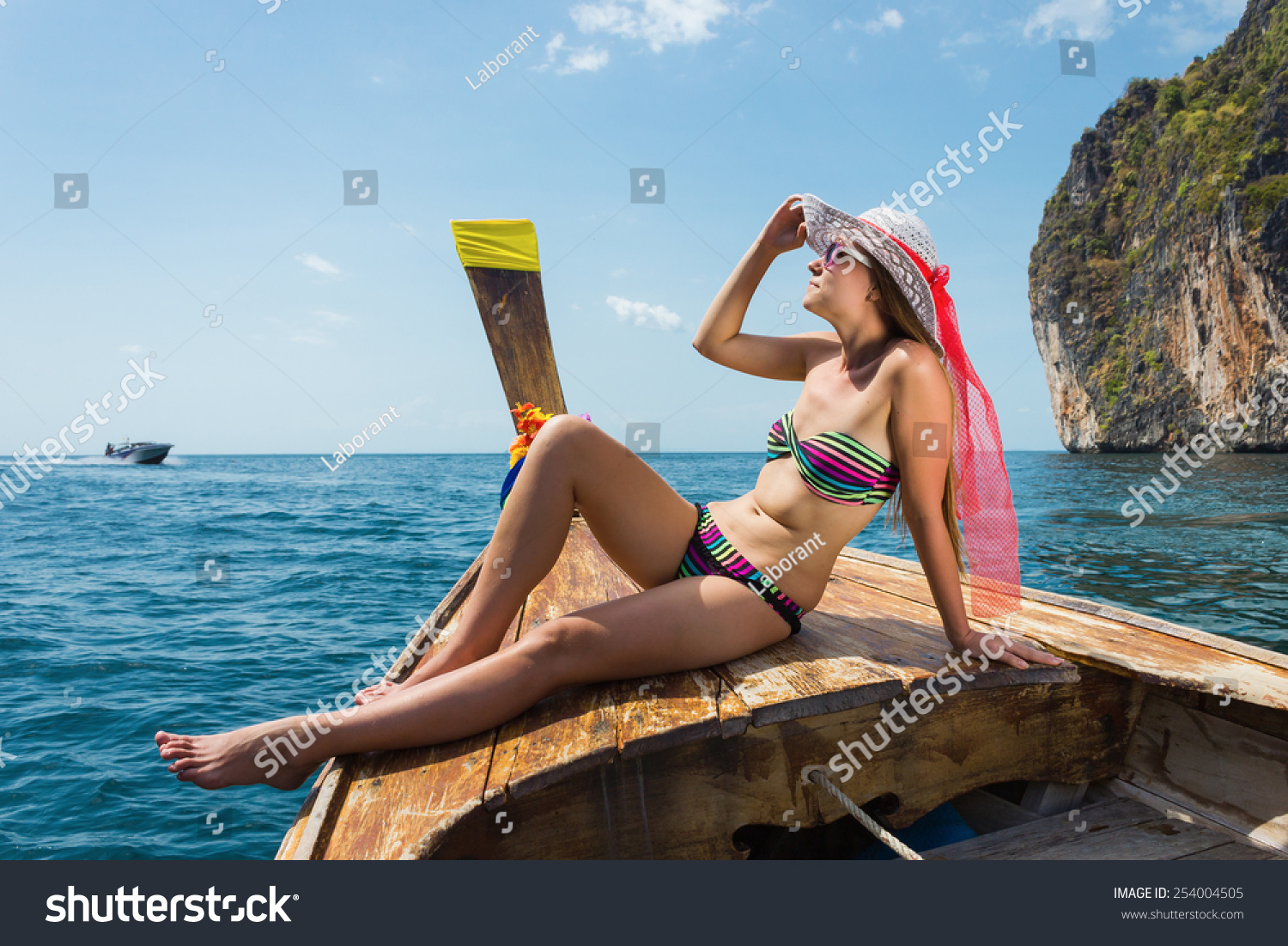 Nude teen girls on a boat