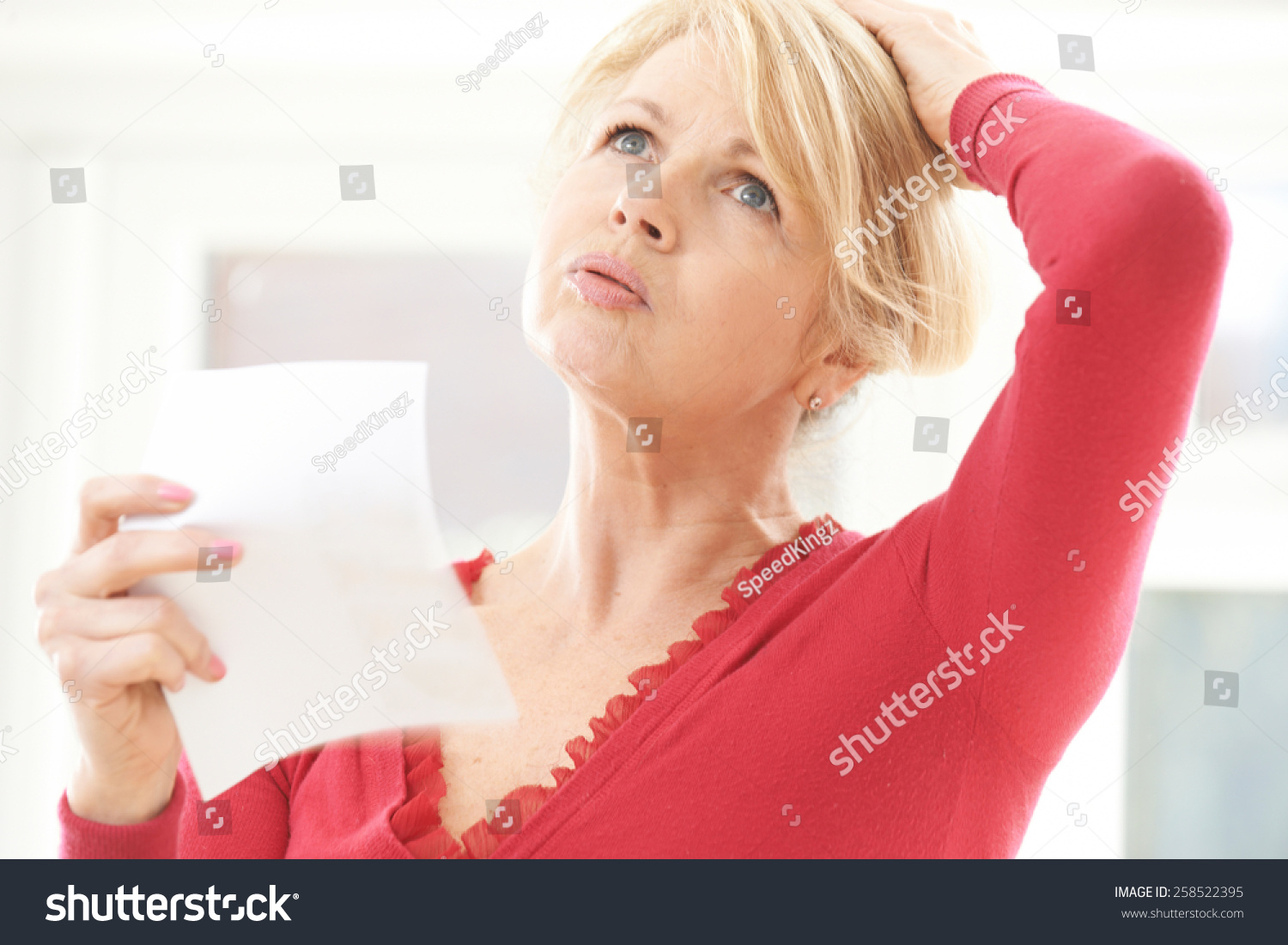 Mature Woman Experiencing Hot Flush Menopause Stock Photo