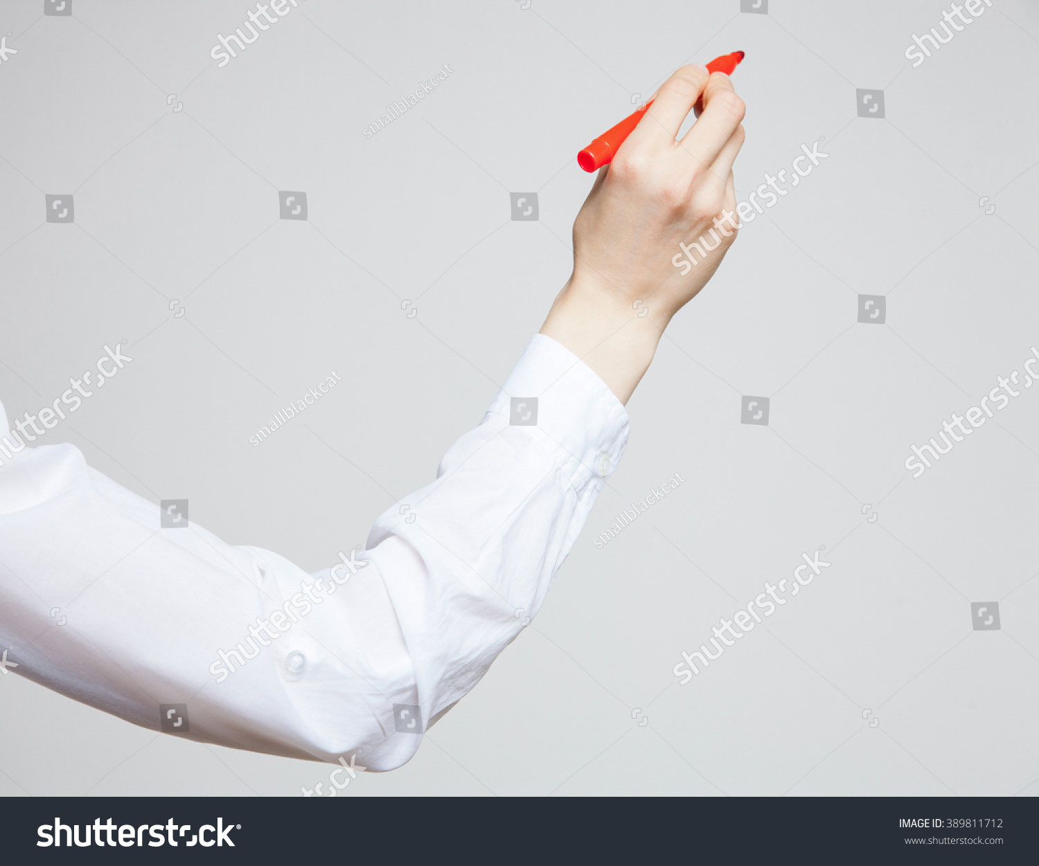 Female Hand Holding Red Marker On Stock Photo 389811712 Shutterstock