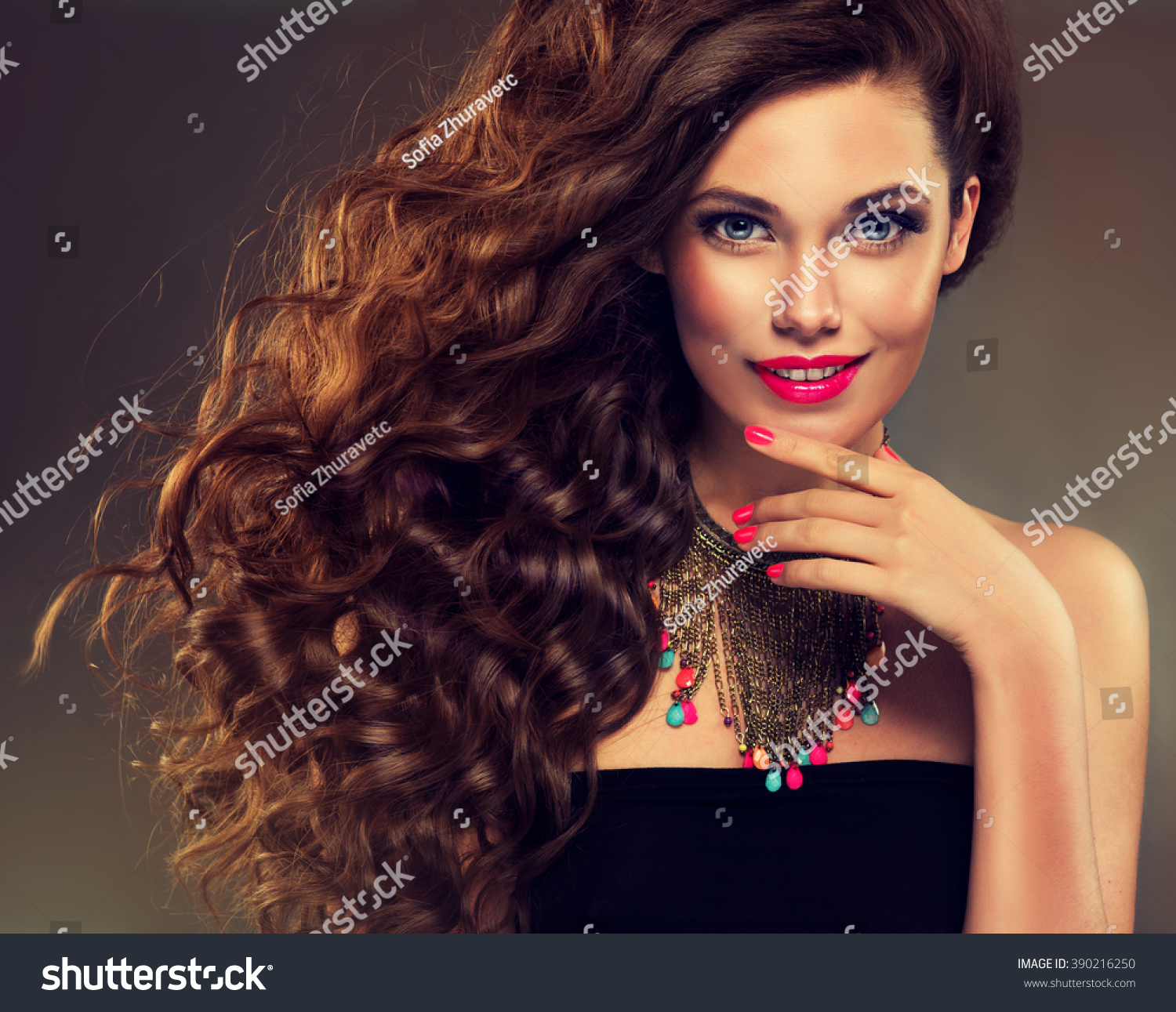 Beautiful Model Brunette Long Curled Hair Stock Photo