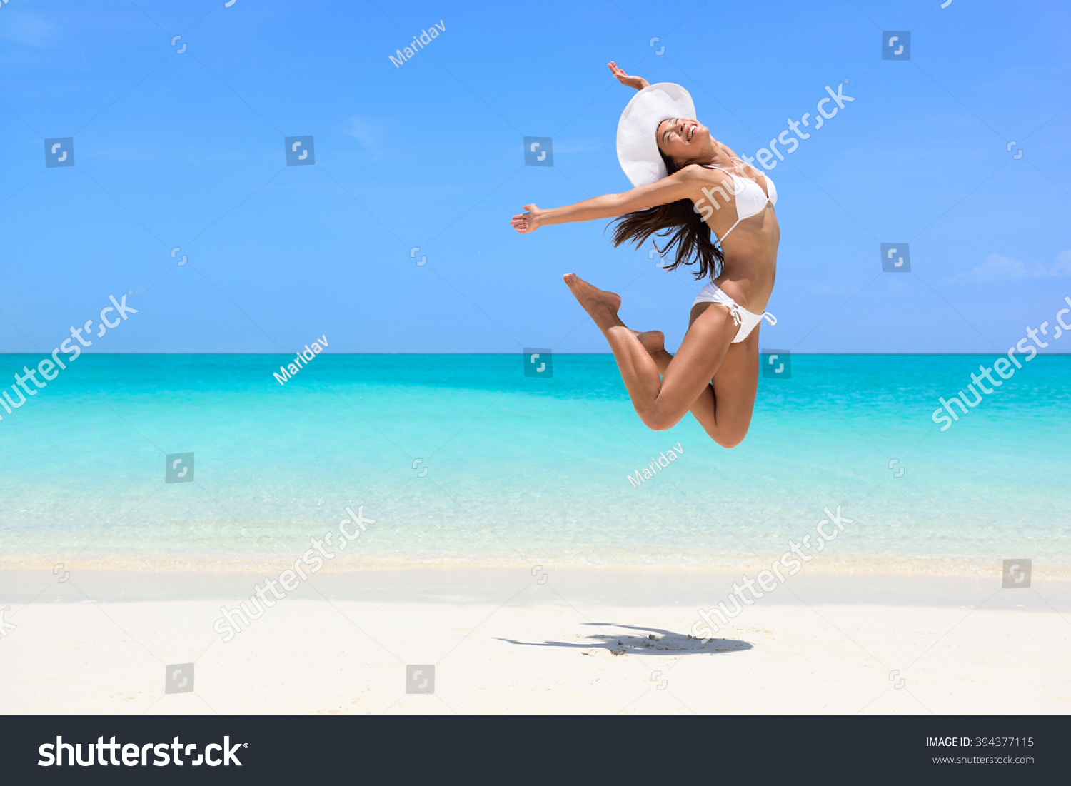 Happy Bikini Woman Jumping Joy On Stock Photo Shutterstock