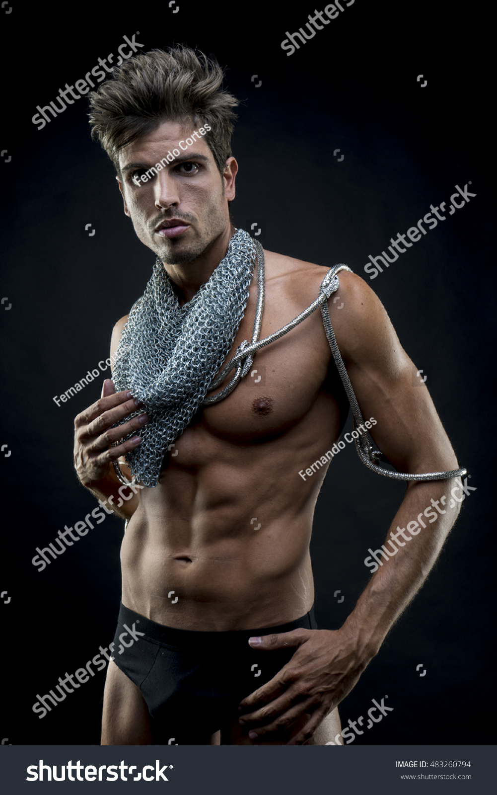 Strength Attractive Naked Man Abdominal Chain Stock Photo