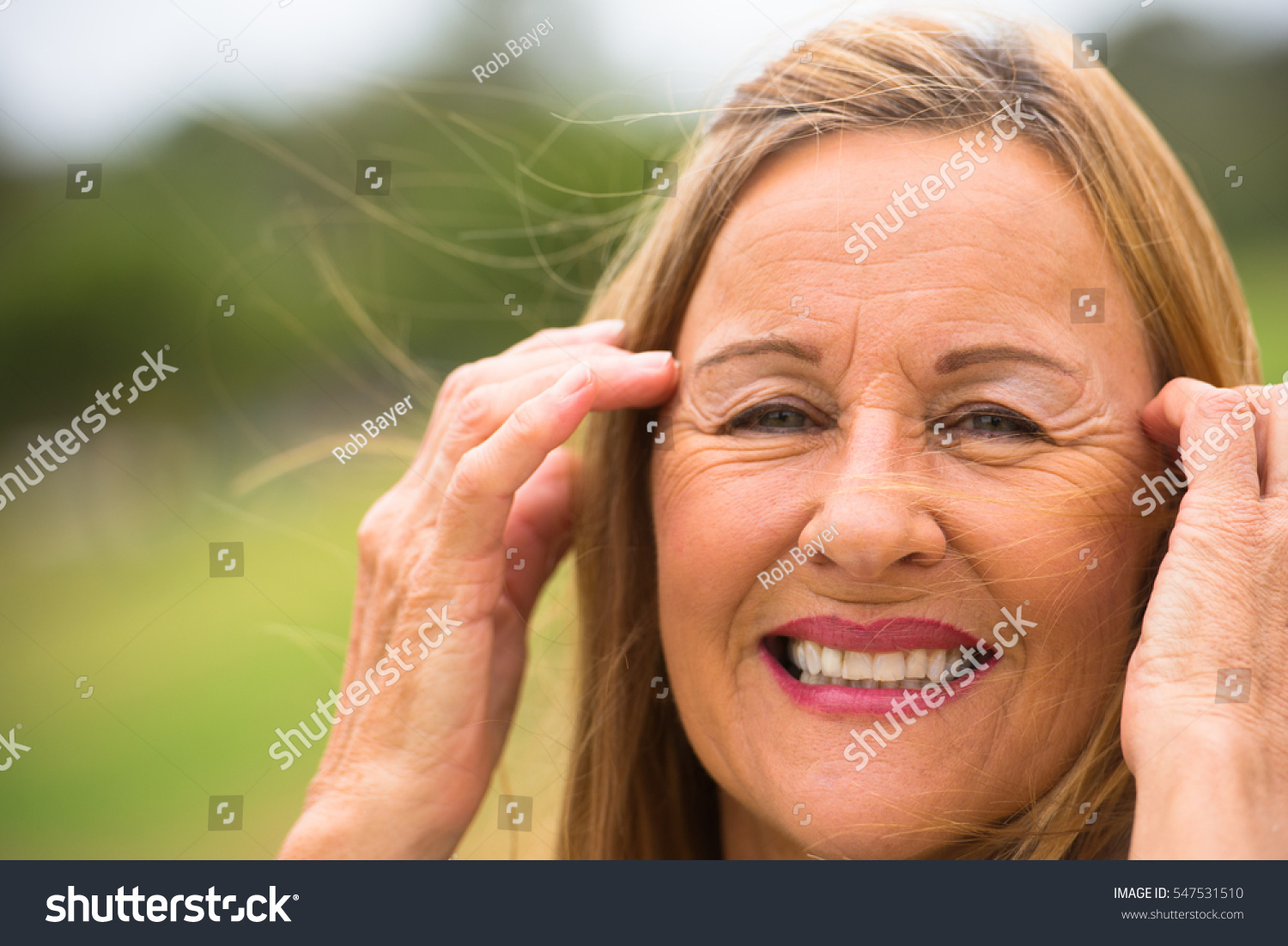 Portrait Friendly Relaxed Attractive Mature Woman Stock Photo