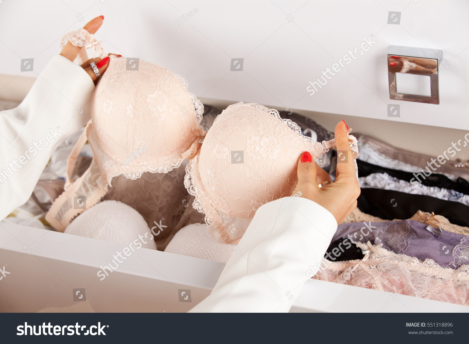 Woman Hands Choosing Lingerie Drawers Filled Stock Photo 551318896