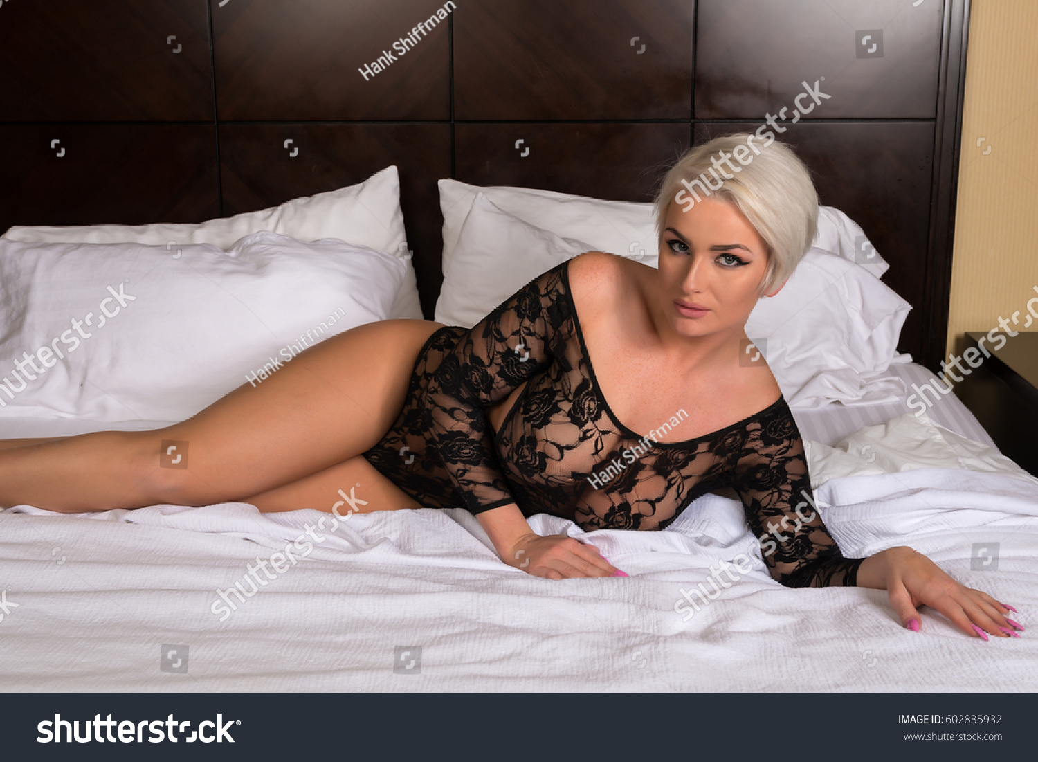 Beautiful Shapely Blonde Black Lace Bodysuit Stock Photo