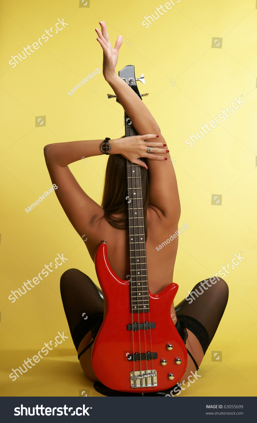 Girl Playing The Bass Naked