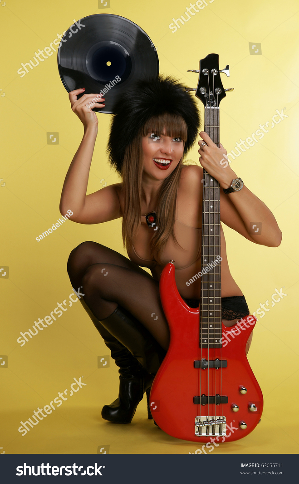 Girl Playing The Bass Naked