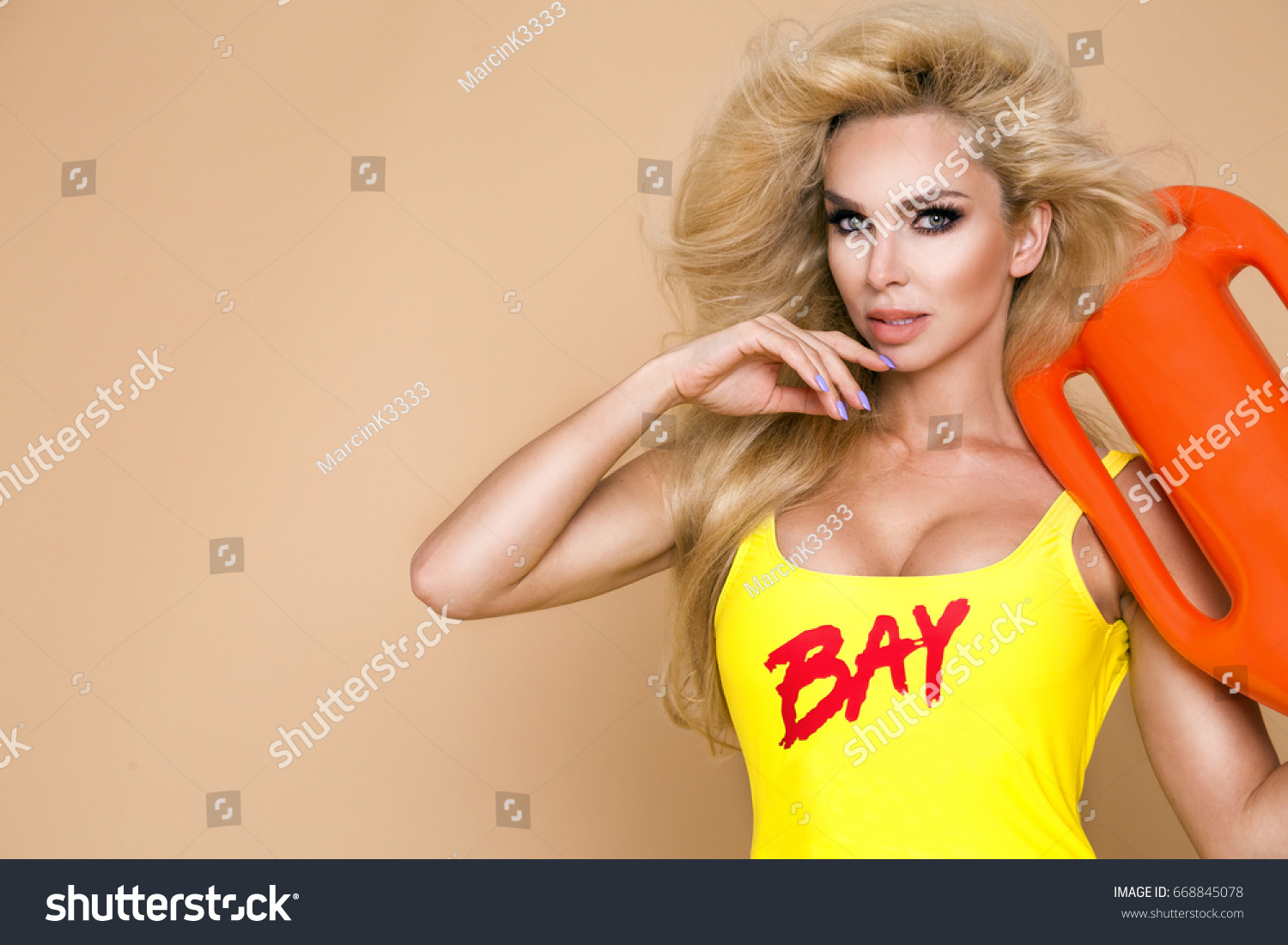 Sexy Busty Lifeguard Woman Bikini Holding ภาพสตอก 668845078 Shutterstock