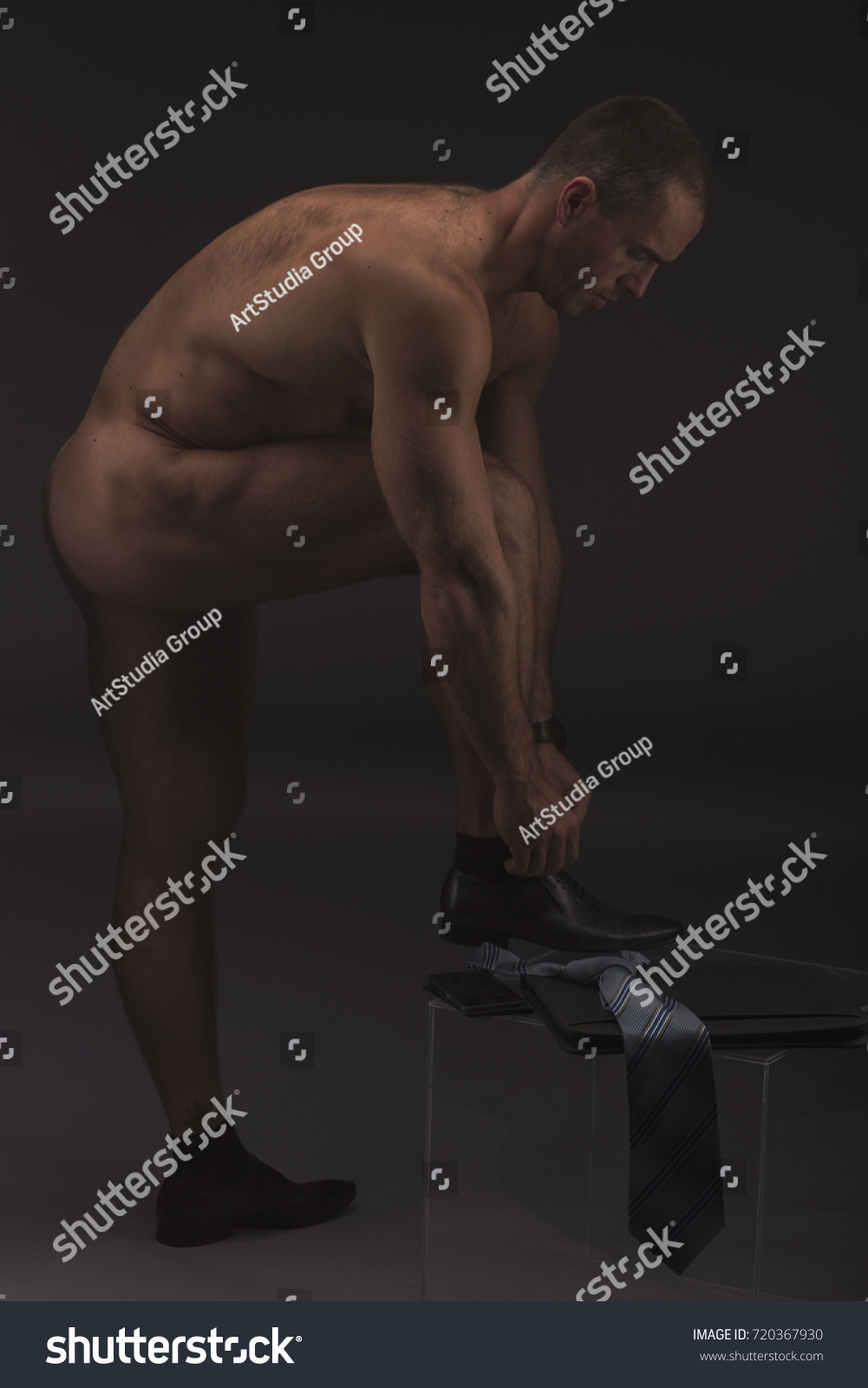 Muscular Sexy Naked Businessman One Leg Stock Photo