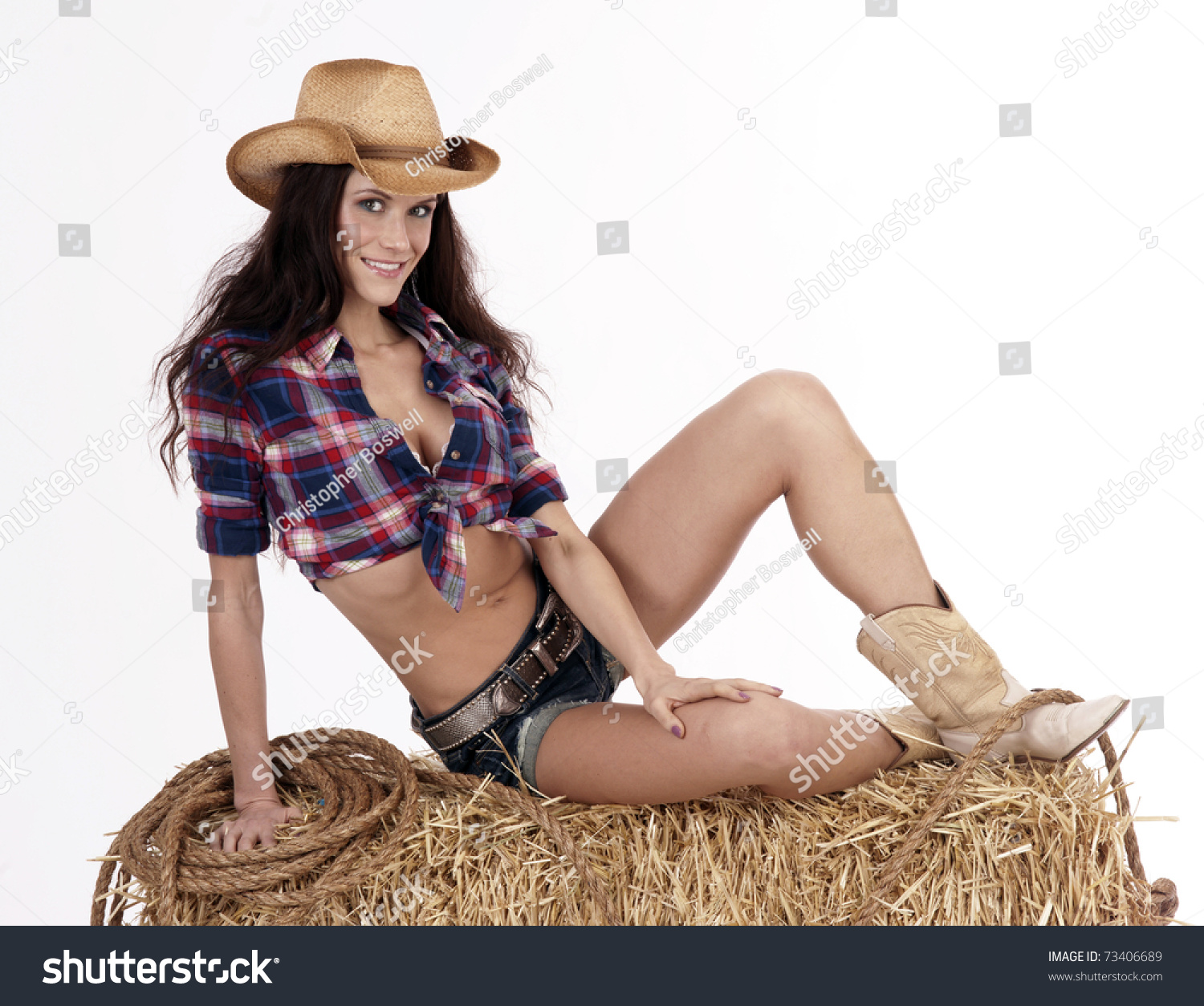 Обнаженная деваха в ковбойской шляпе