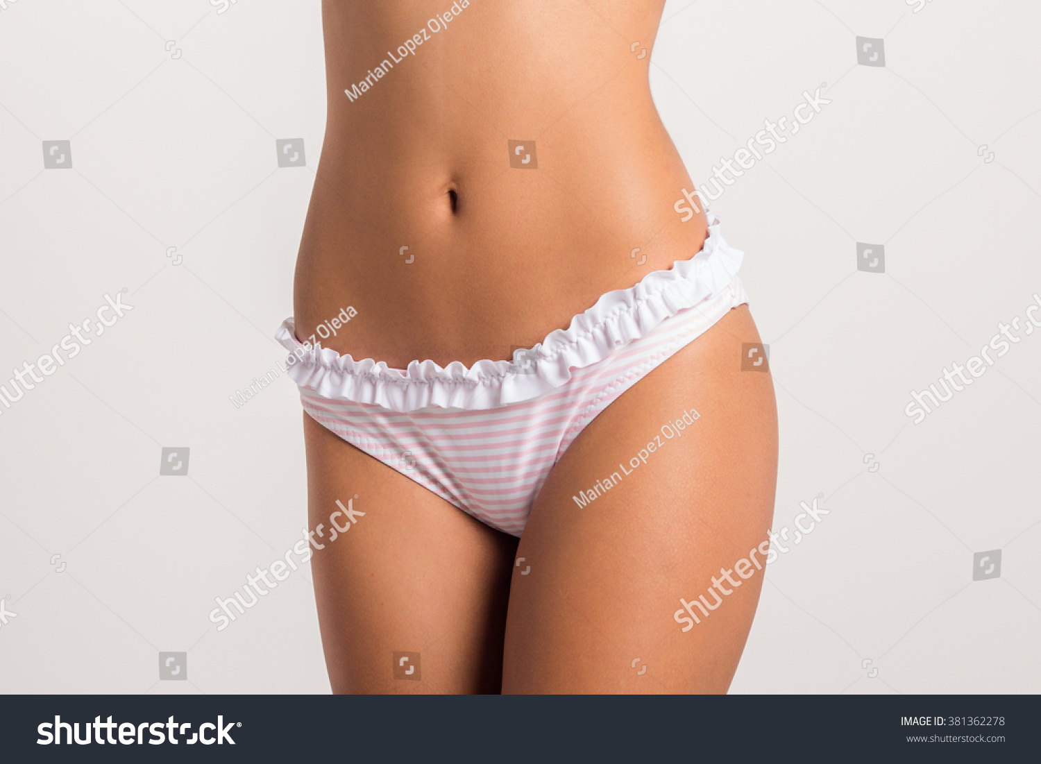 Front View Of A Fit Beautiful Young Woman In A Bikini Close Up Stock