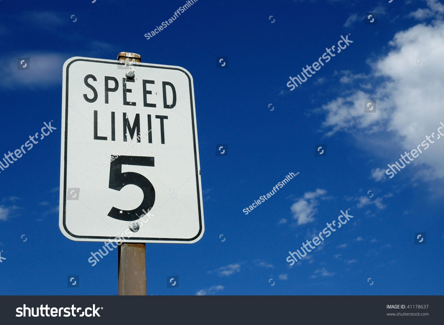 5 Mile An Hour Speed Limit Sign Against Blue Sky Stock Photo 41178637 5-mile-an-hour-speed-limit-sign-against-blue-sky-stock-photo-41178637
