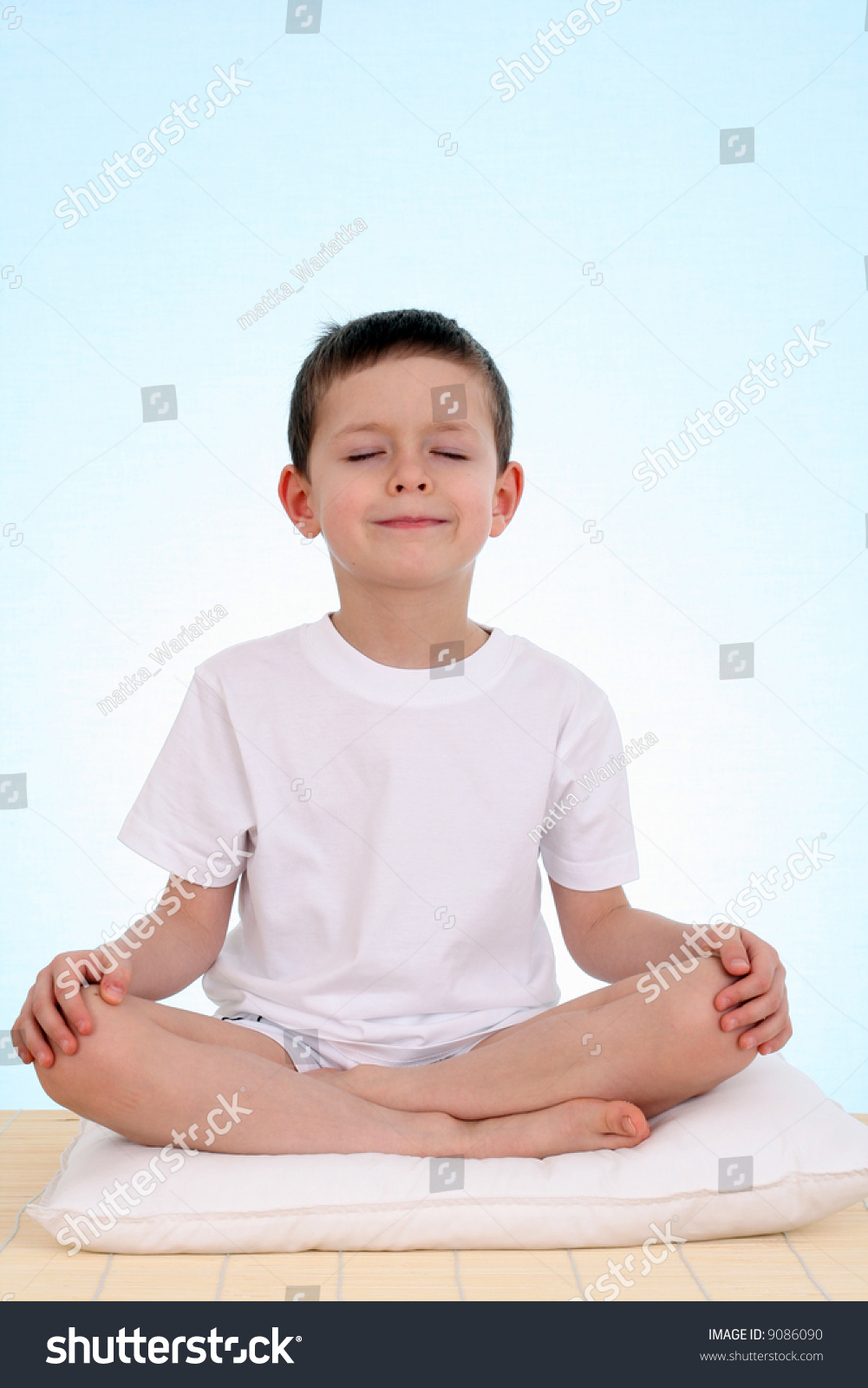 6 Years Old Boy Relaxing On Blue Background Stock Photo 9086090