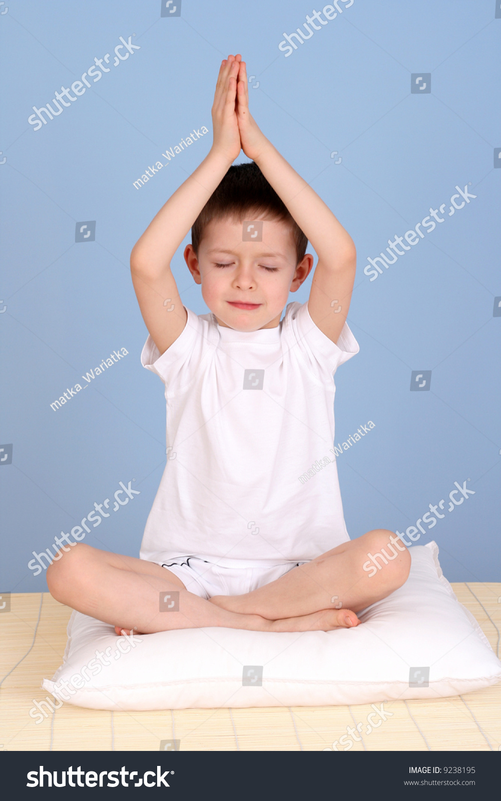 6 Years Old Boy Relaxing On Blue Background Stock Photo 9238195