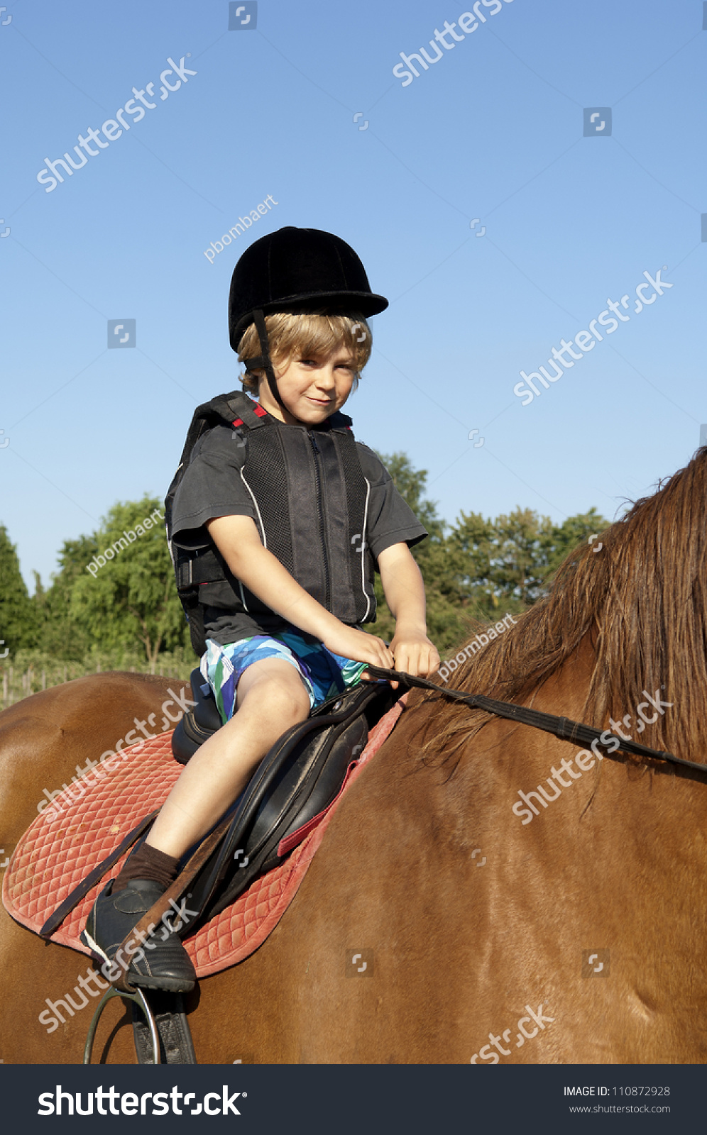 Young Boy Ride A Horse Stock Photo 110872928 Shutterstock