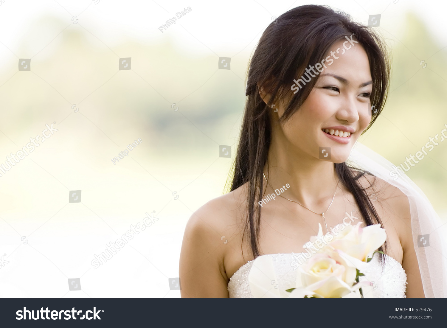 Beautiful Asian Bride Poses Outside 79