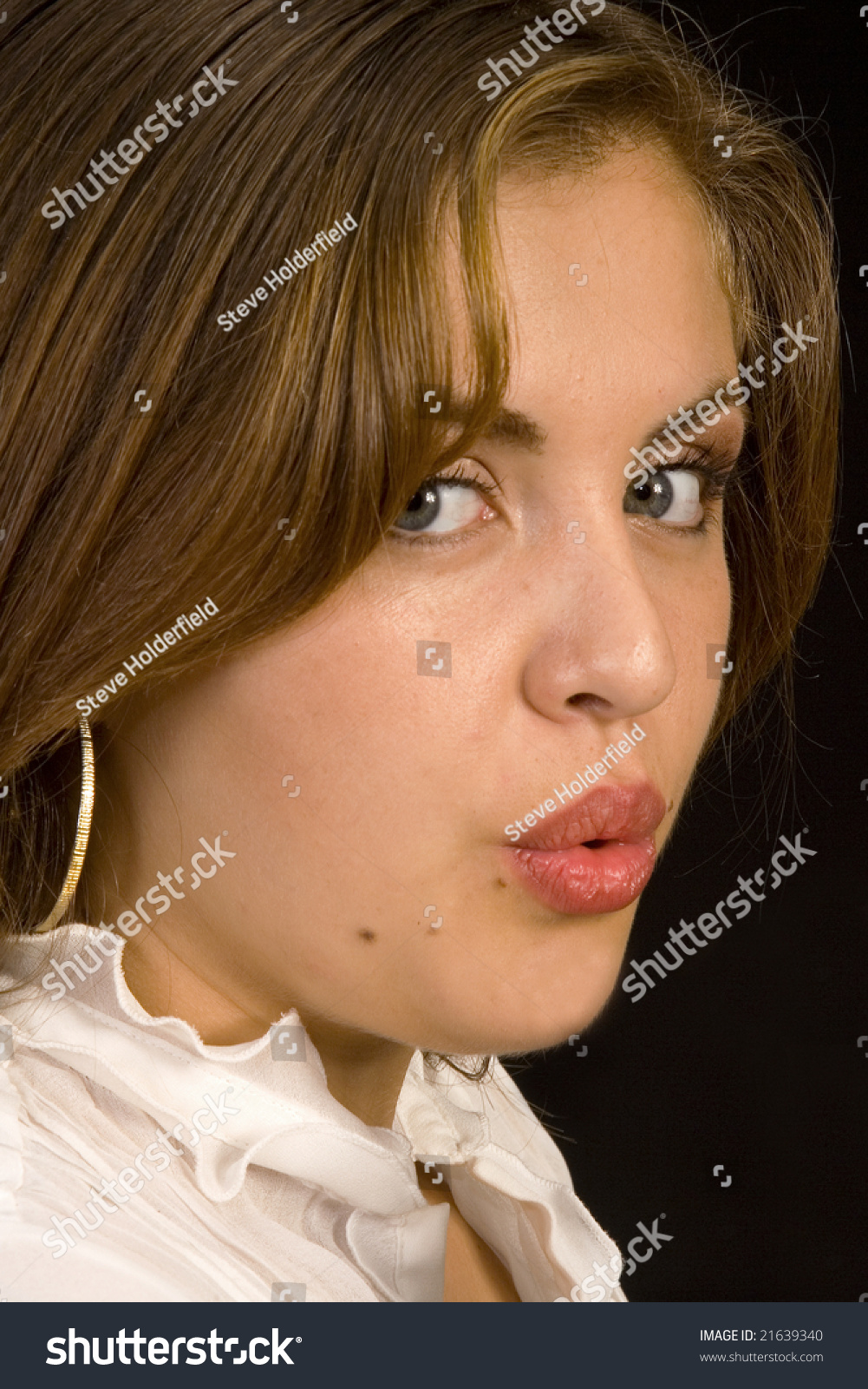 A Beautiful Women Puckering Her Lips. Stock Photo 21639340 : Shutterstock