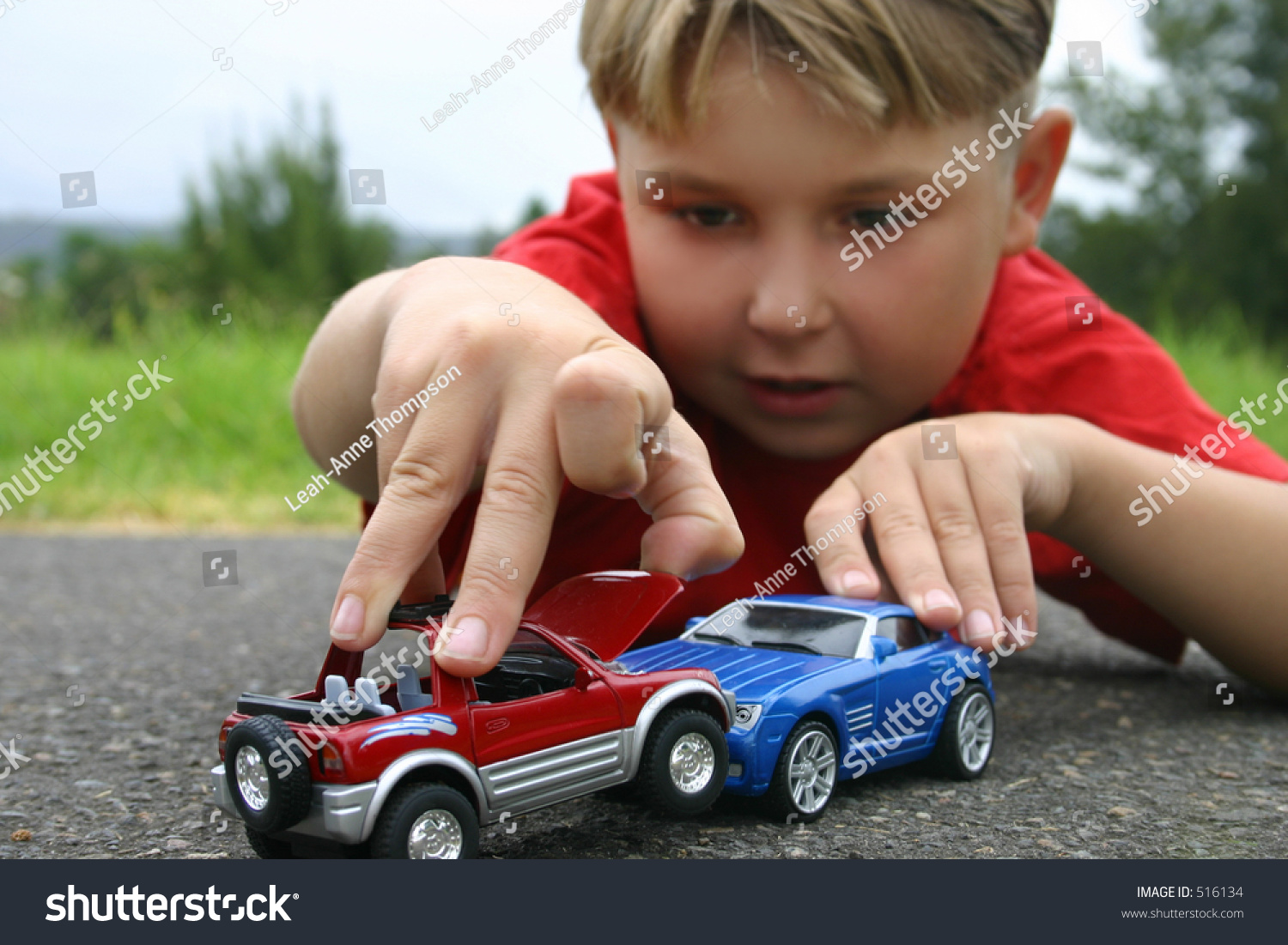 playing with toy cars