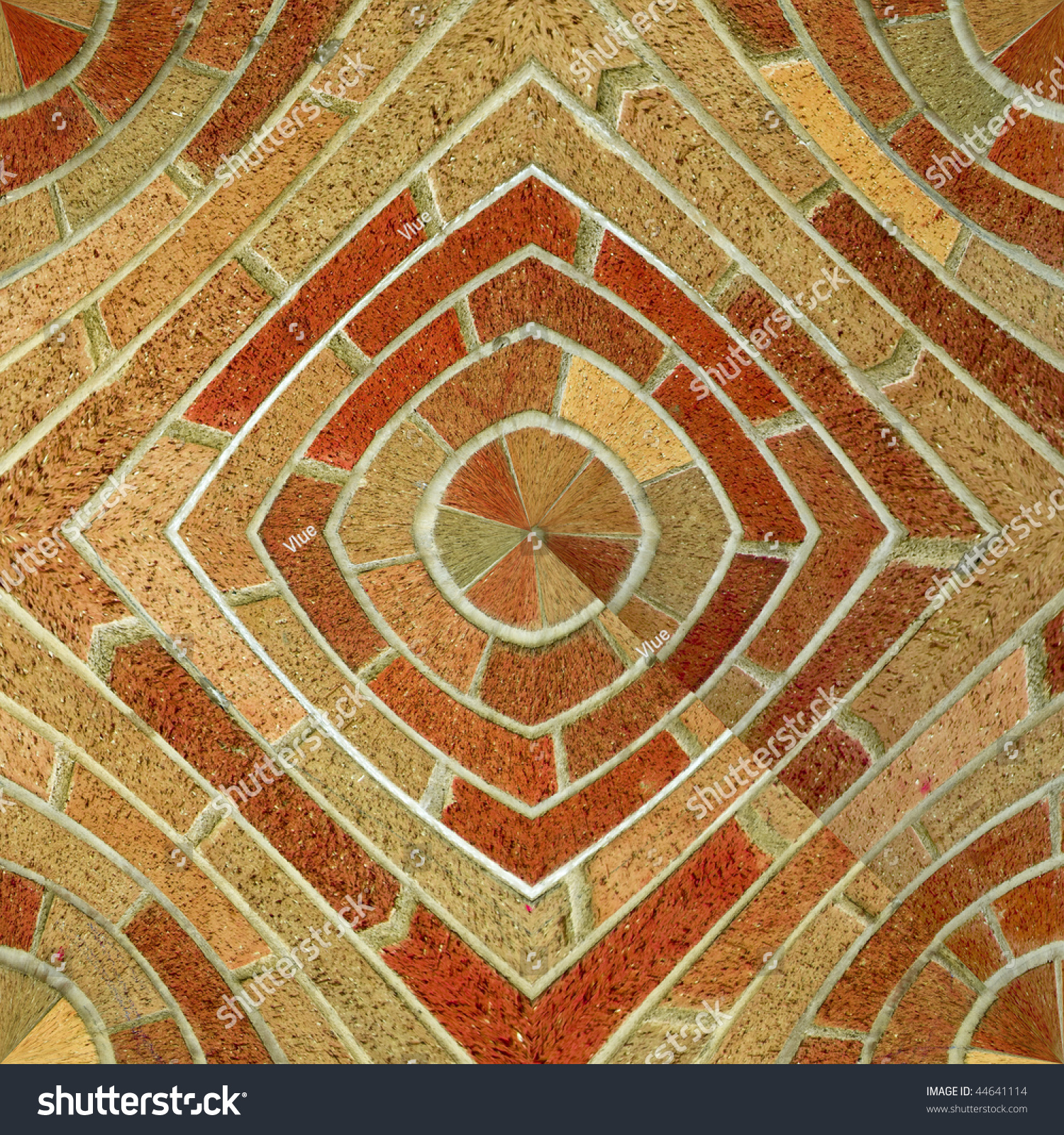 A Circular Brick Pattern Background Texture Of Red And Brown Bricks