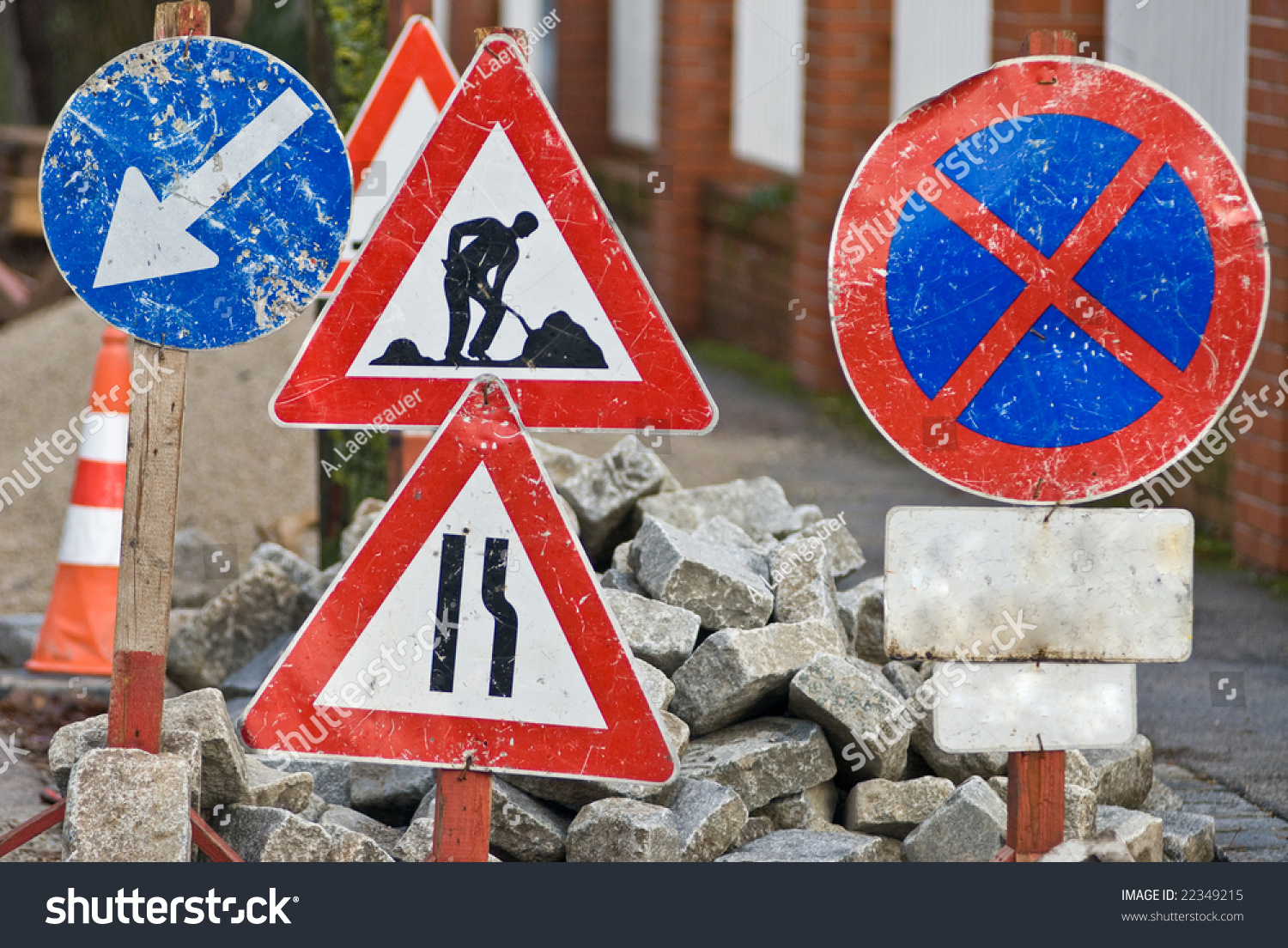 a-construction-site-with-a-lot-of-street-signs-stock-photo-22349215