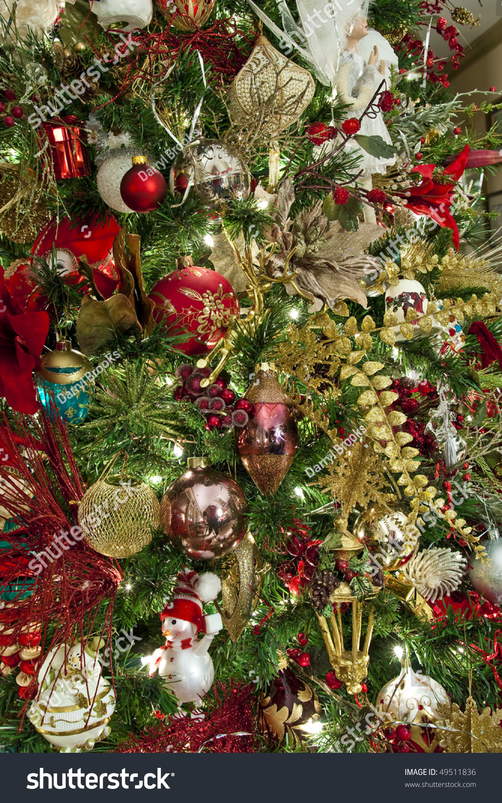 a custom decorated christmas tree with many red silver a custom decorated christmas tree with many red silver